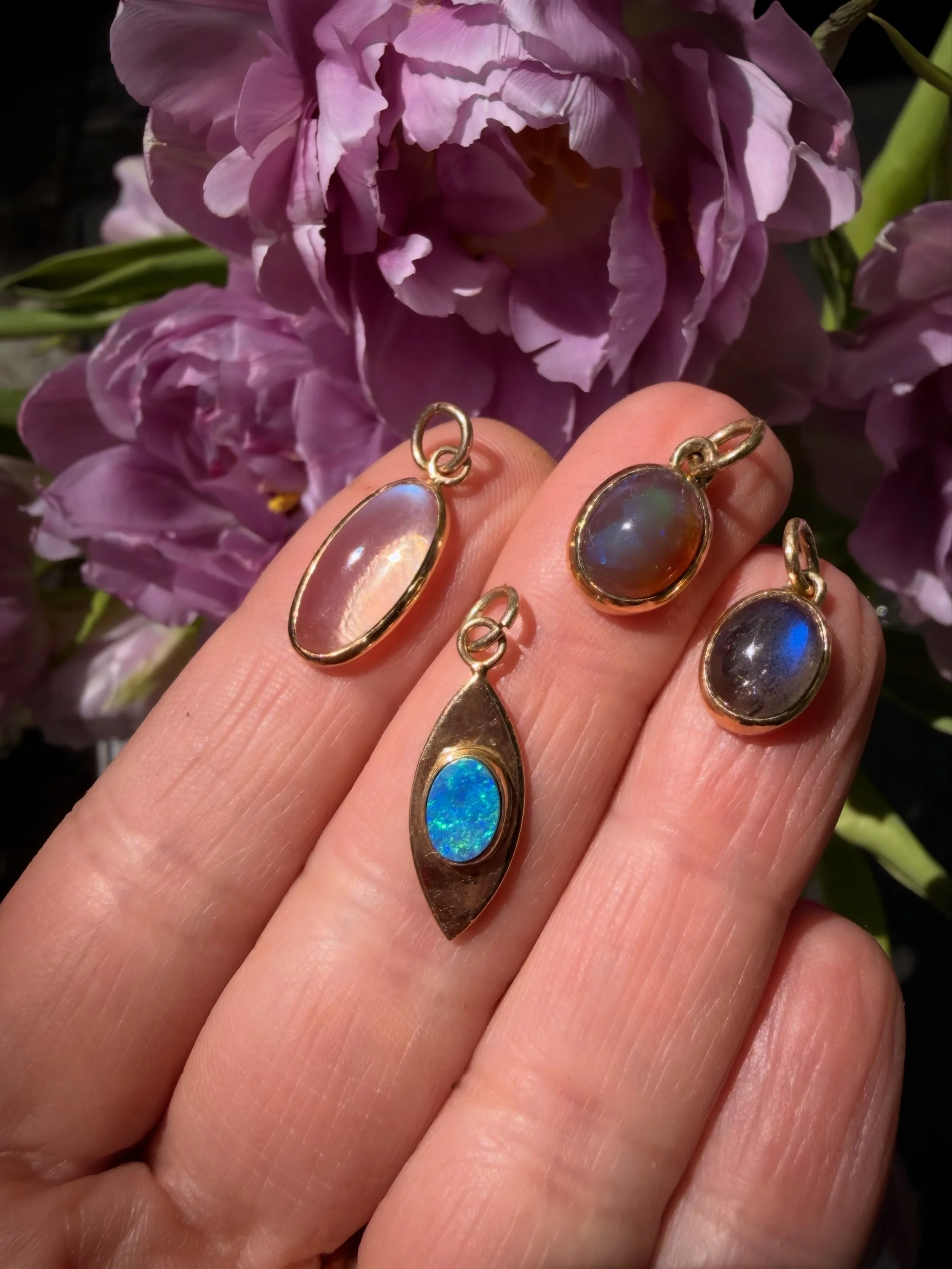 Some of my favourite glowing things and a little extra magic from the garden.

Iridescent glowing beings catching the light and blooming with flashes of blue, violet and green.
A bath of sunlight and warmth, birds and creatures chirping in the backgr