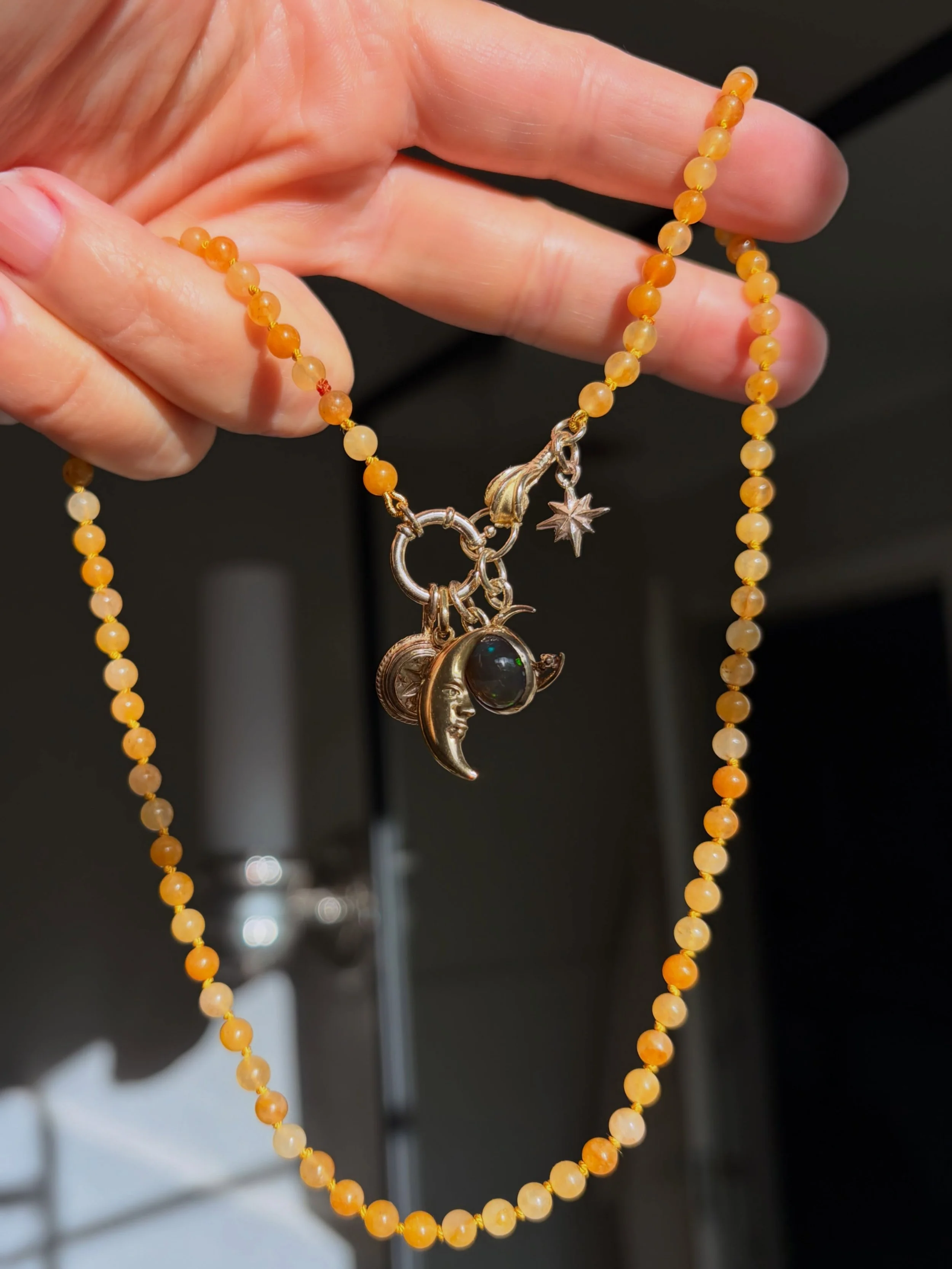 Equinox Charm Jumble ☽

Today&rsquo;s charm jumble is a celebration of the moment when light and darkness meet in balance, before the nights begin to grow longer.

A vintage man in the moon, a tiny north star to guide the way, a glimmering opal, a Vi