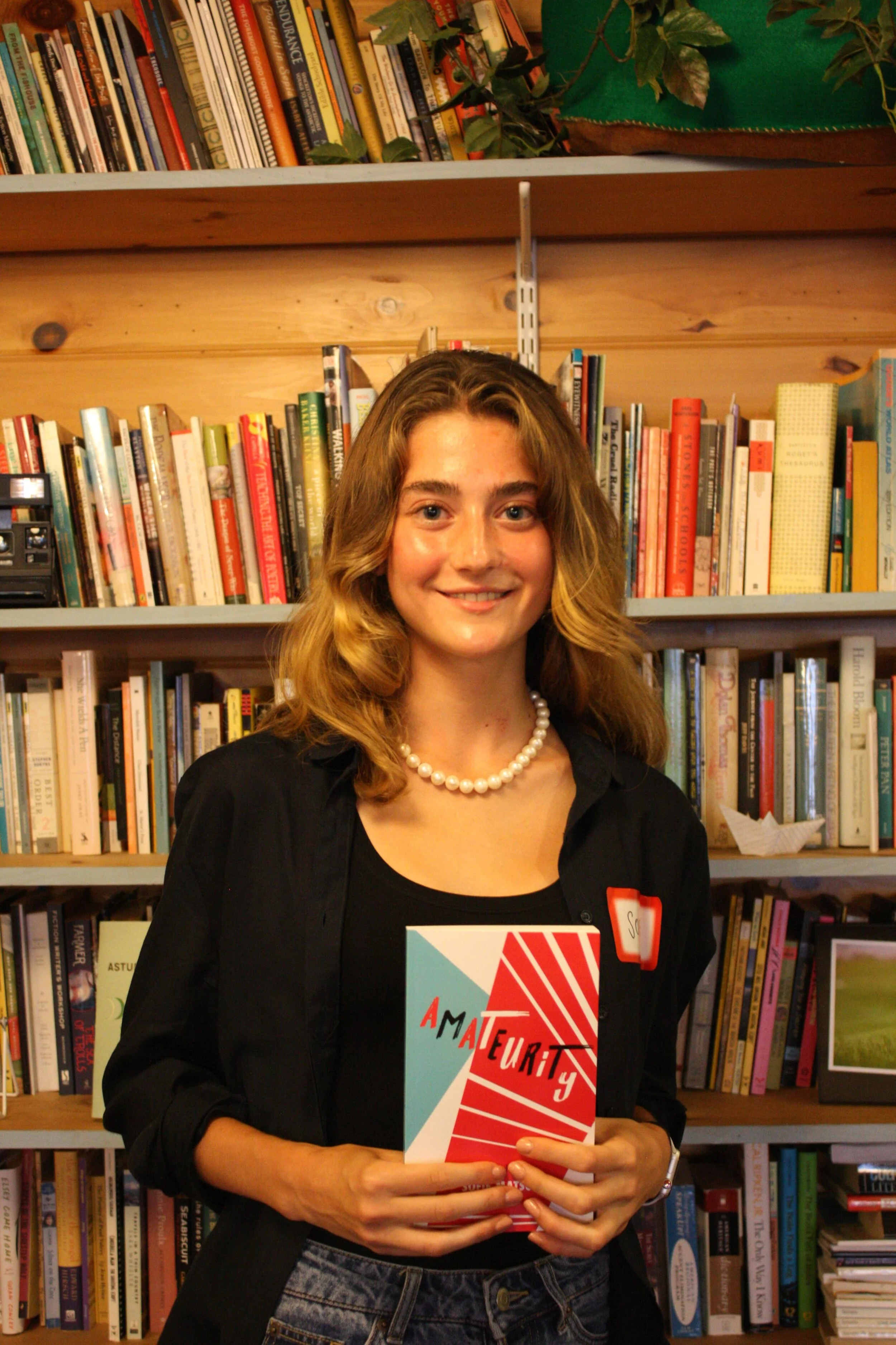 "Champion distance runner has a new accomplishment at 18 – author" (Portland Press Herald)