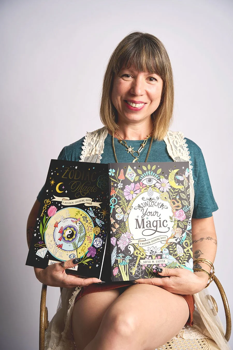 Sofia M. Liotta, the author and illustrator of Zodiac Magic and Unlock Your Magic: adult mystical coloring books.