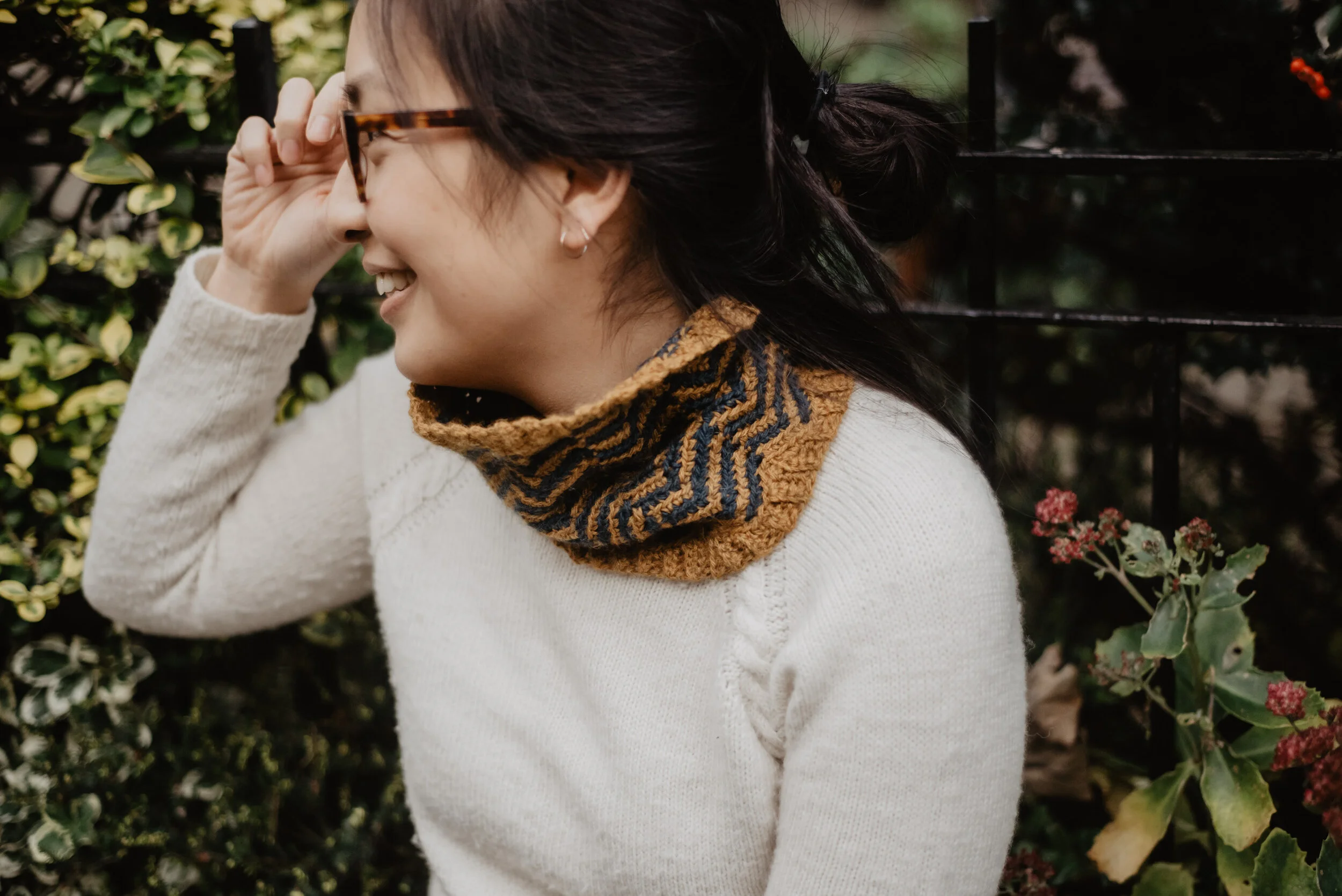 Close-up shot of Alyson modelling the Tweel Cowl outdoors