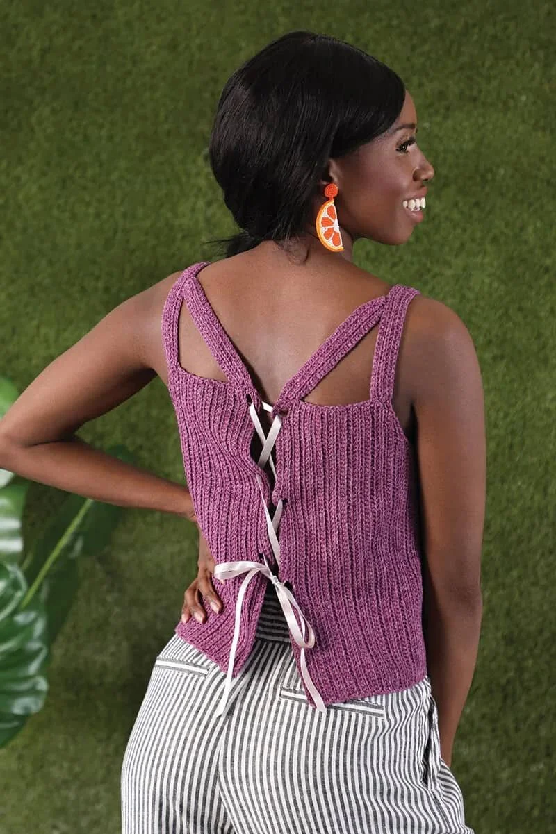 The back of the crocheted Alfresco features peekaboo straps and a ribbon lace up