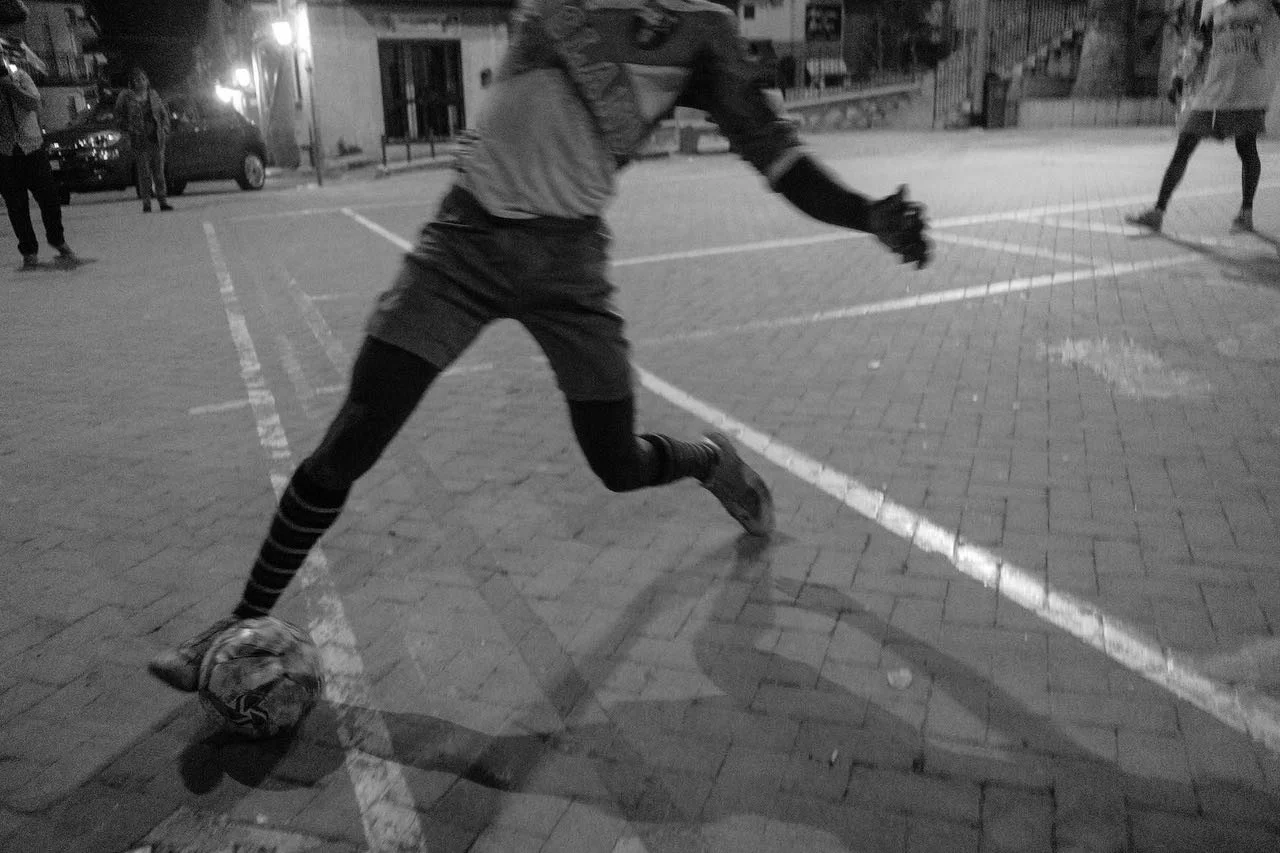 UN CALCIO ALLA MAFIA - 05, 12, 2018 Bolognetta, Palermo, Italy. A football match in the evening with the antimafia heroes in the background. A kick to the mafia!

Before to get hired to document with my cameras football stories, I realized this work 