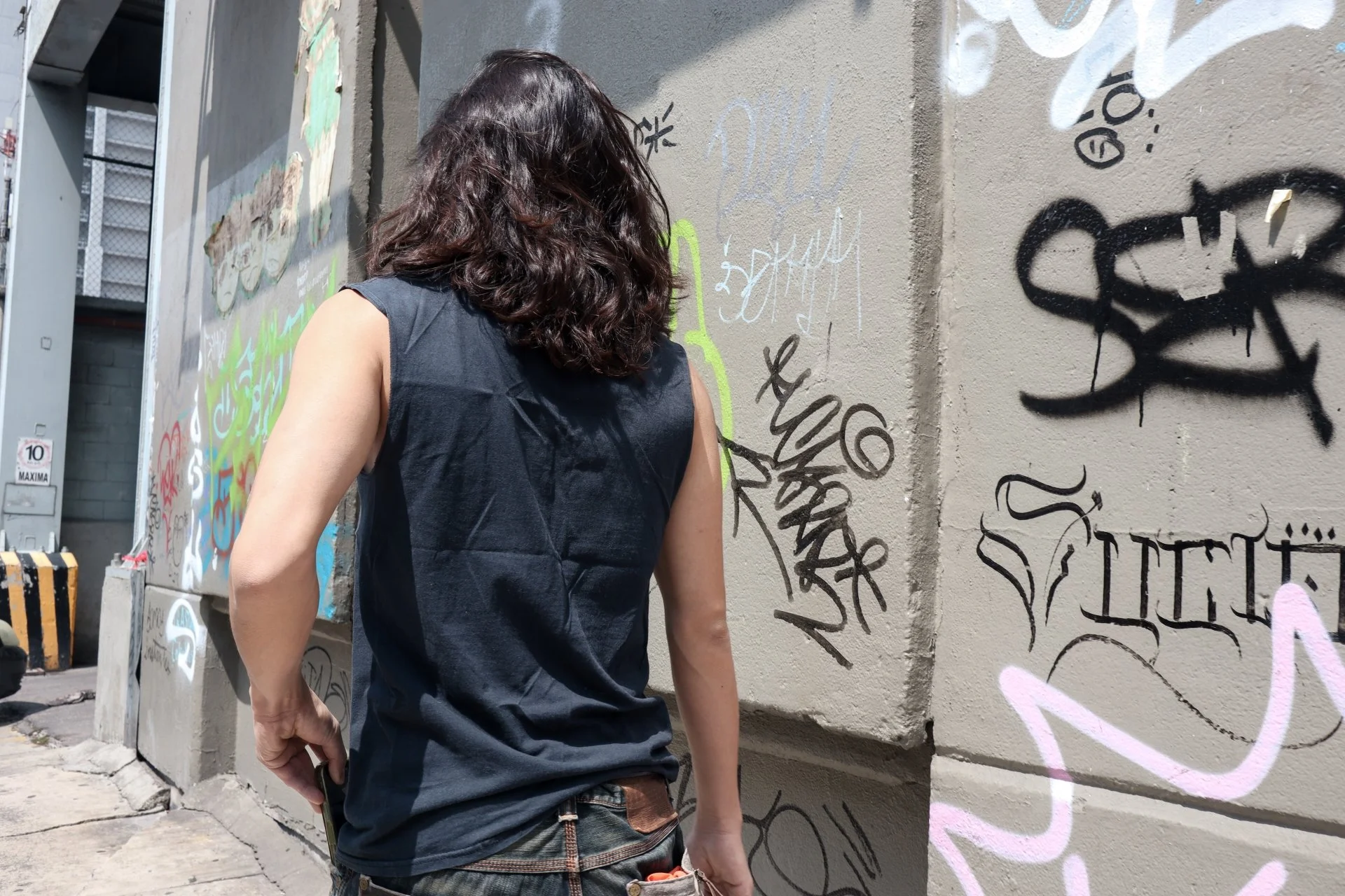 Man in a street of Mexico City with urban context