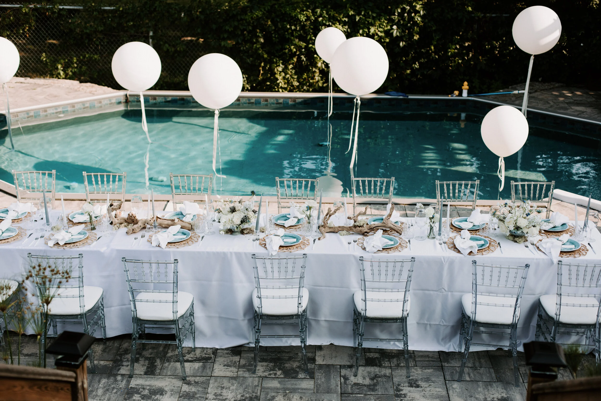 Pool Balloons and table florals