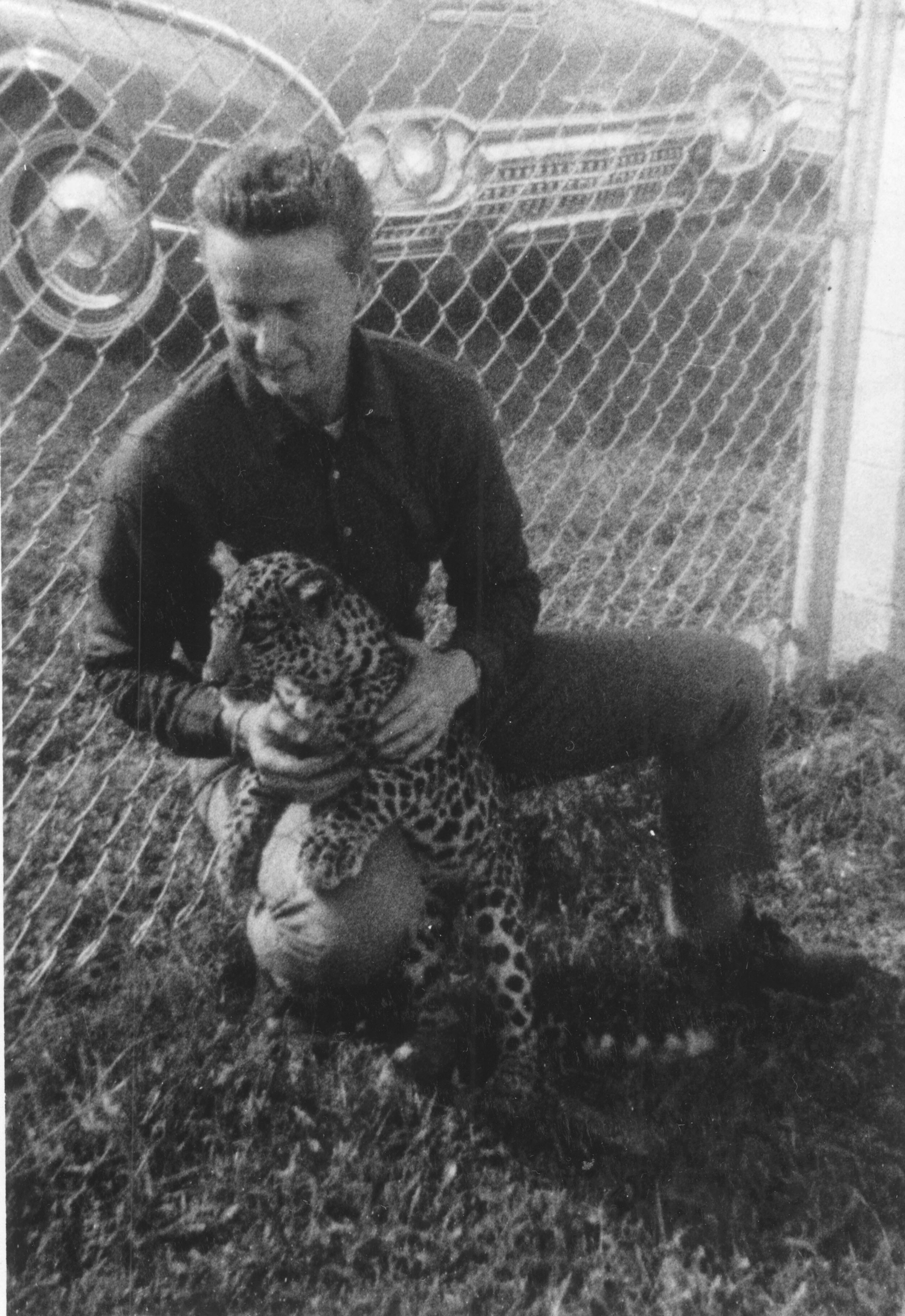  Erickson and pet leopard Henry. 