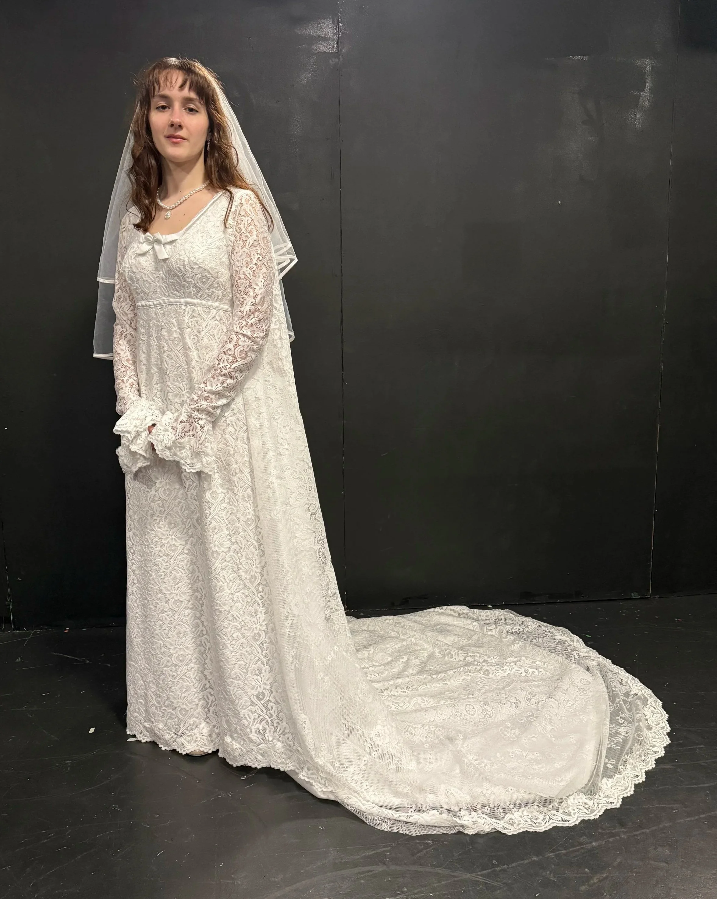 Custom handmade 1970s inspired wedding gown for the character of Amy.