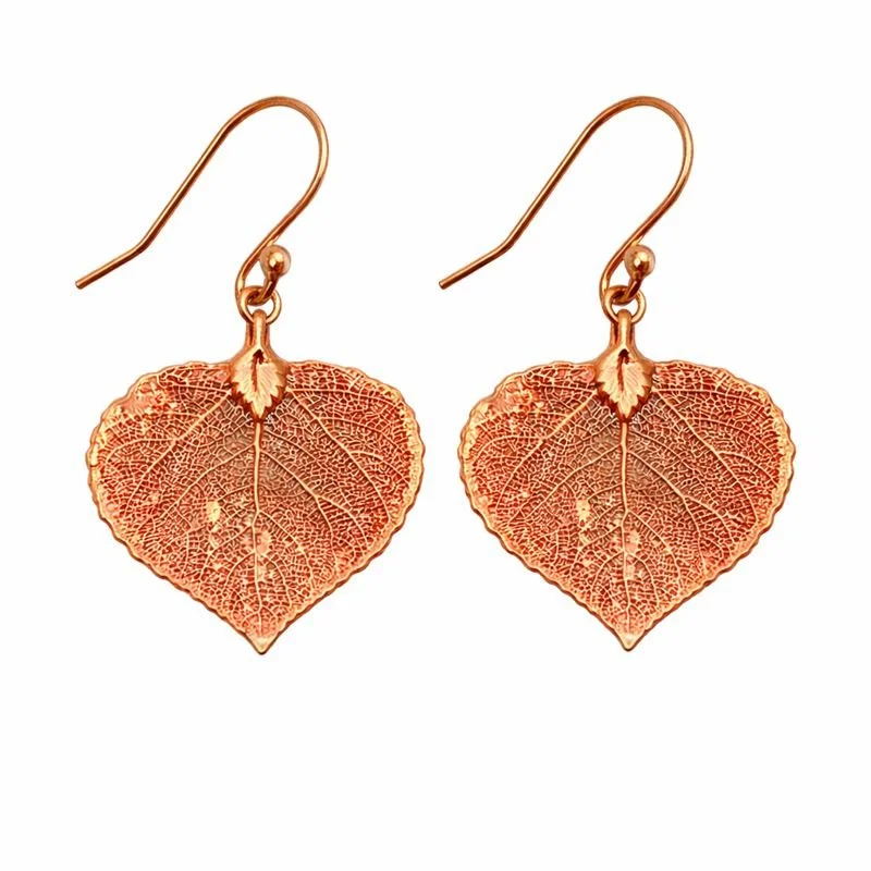 4 copper earrings on white.jpeg
