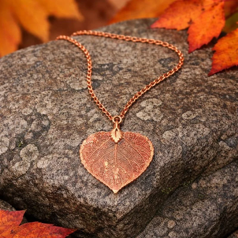 4 copper necklace on rock.jpeg