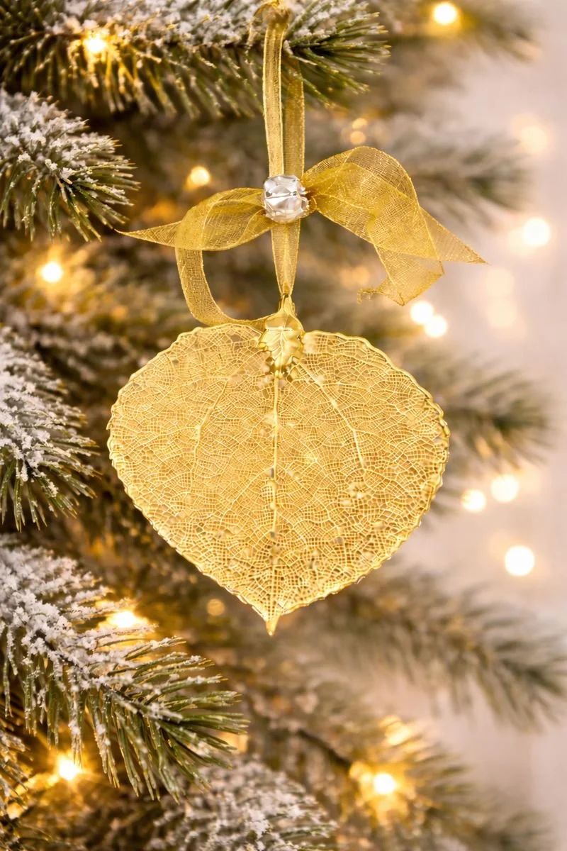 gold ornament on tree.jpeg