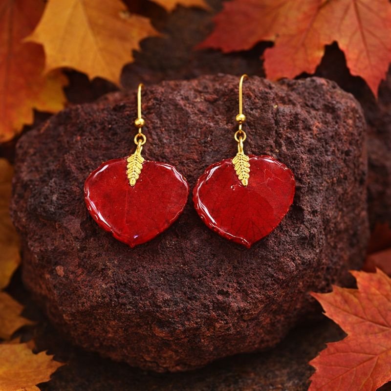 red resin ear on a rock.jpeg