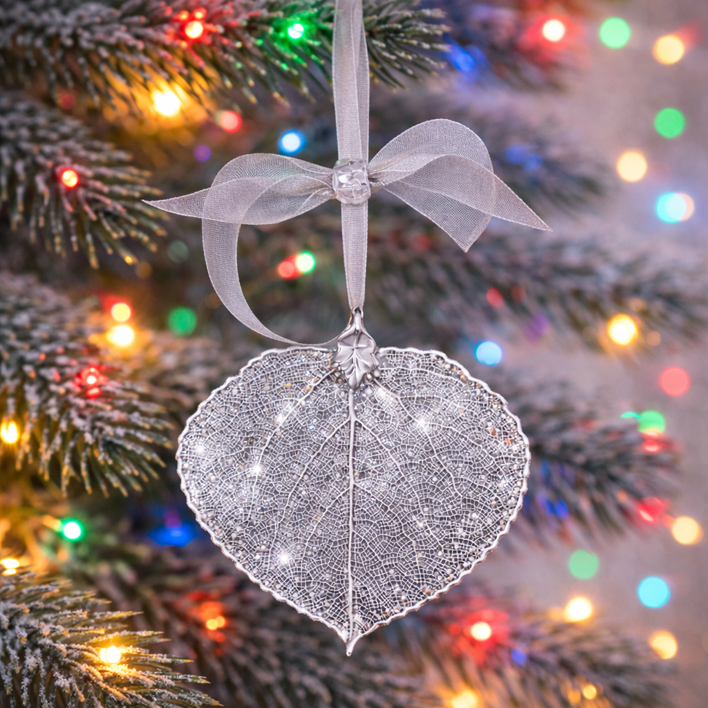 silver ornament on tree.png