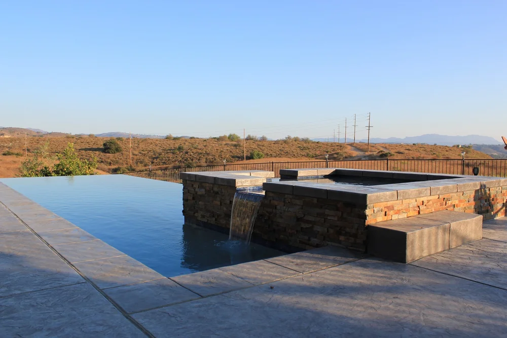 Hansen infinity-edge pool with a raised spa