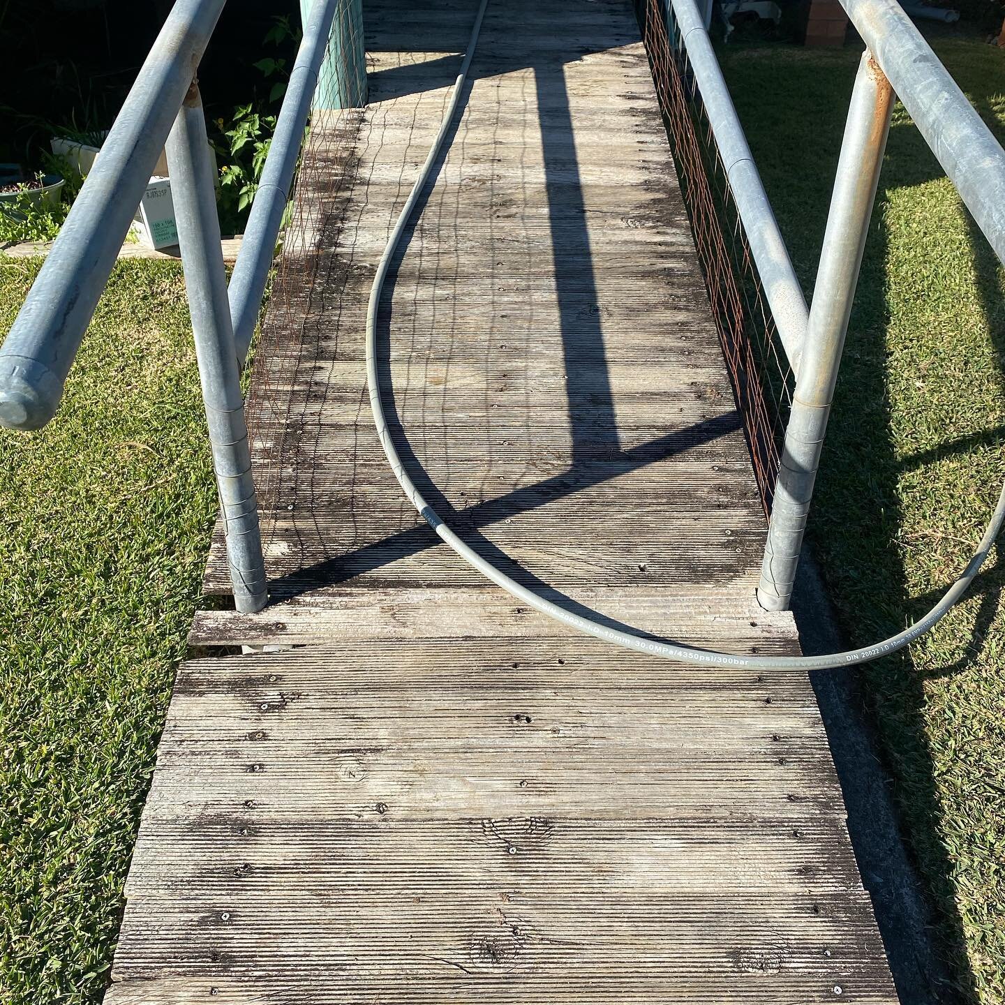 Our elderly client needed some new pathways so she could get around her yard better. She recently had a hip replacement and a knee replacement at the age of 91yrs. I saw her old ramp and path as well as her old driveway that looked pretty dangerous a