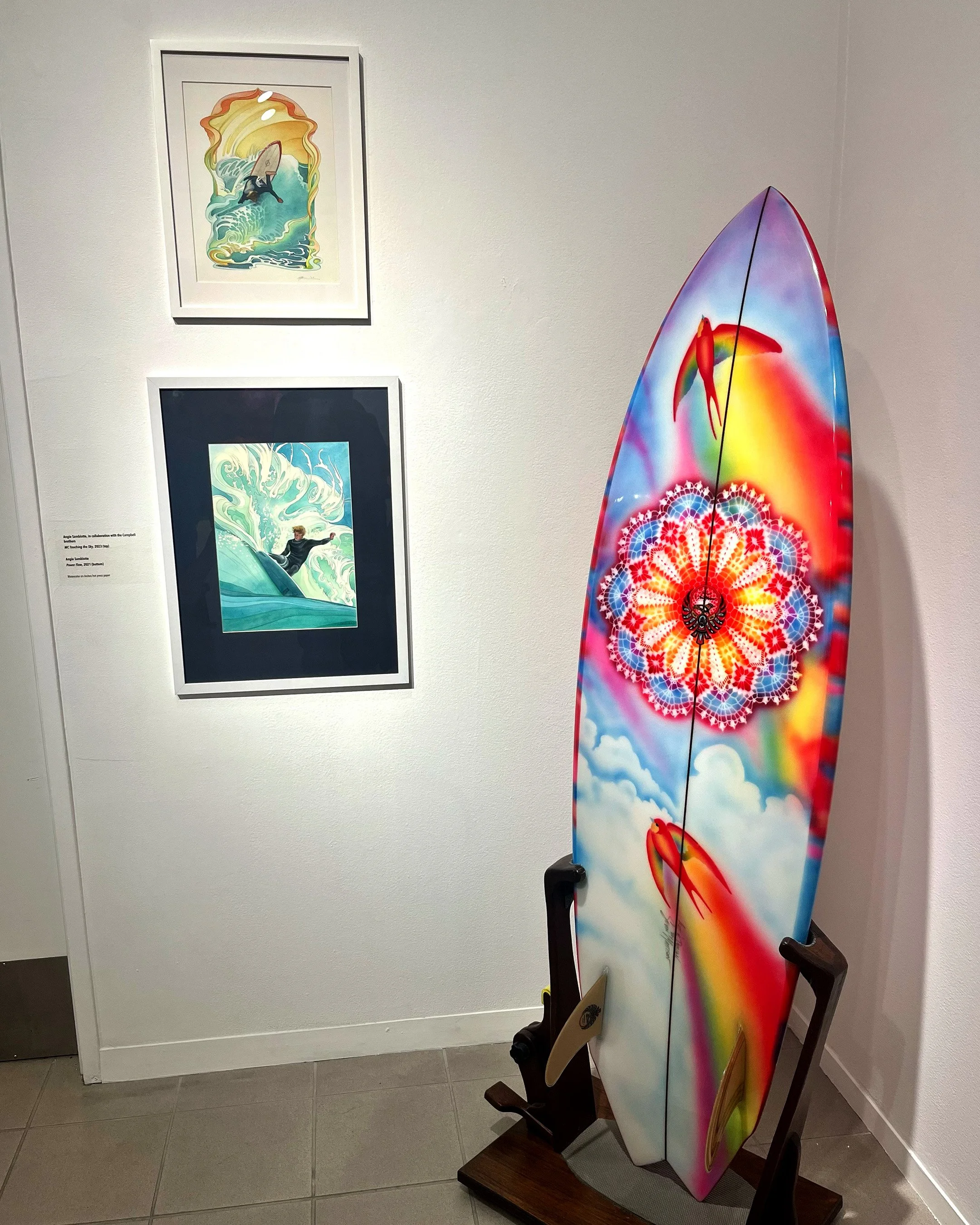 “MC Touching the Sky” on top, “Power Flow” on bottom; next to beautiful airbrushed board by Sean Mattison.