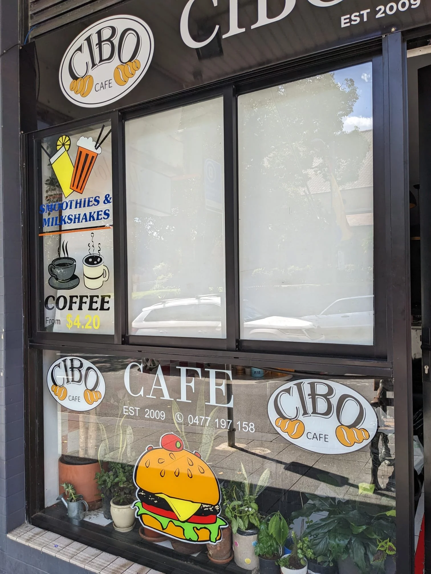 Cibo Cafe window signs Mar 23.jpg