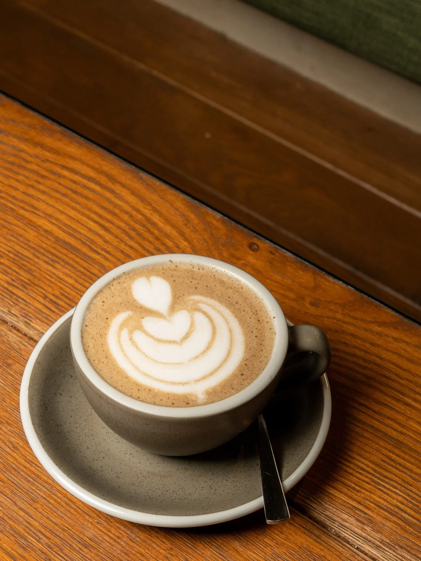 Our Chai Latte brings together seven-spiced chai and milk for something warm and grounding while The Peach Sparkler blends black tea with sliced peach, peach syrup, and soda water for a light, uplifting sip.

Two different moods, both made to ease in