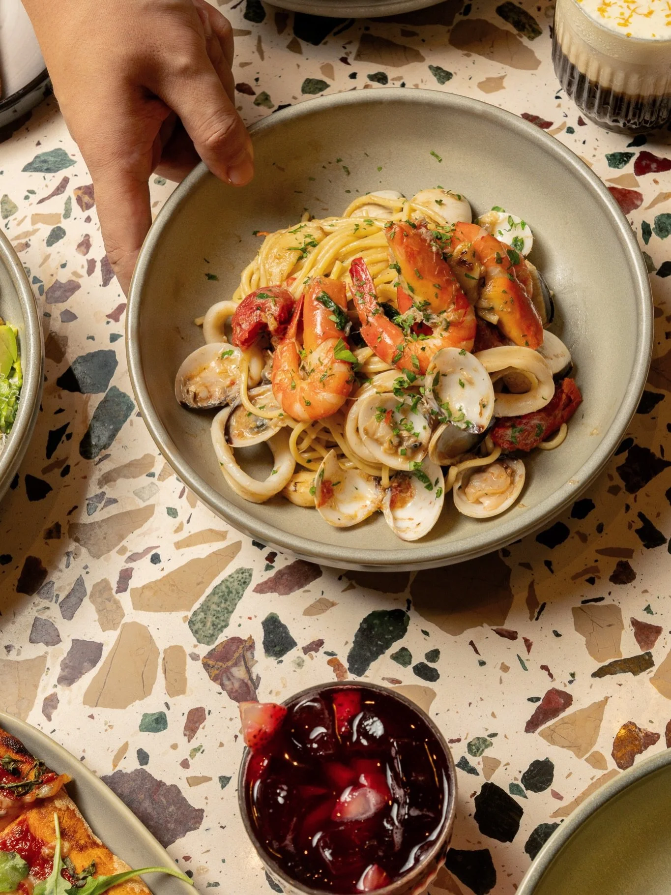 Fresh, savoury, and full of character, this pasta brings together ocean flavours with gentle heat and balance.

Our Seafood Aglio Olio is a satisfying brunch option that feels light yet flavourful with every forkful.

Available for brunch at our Heri
