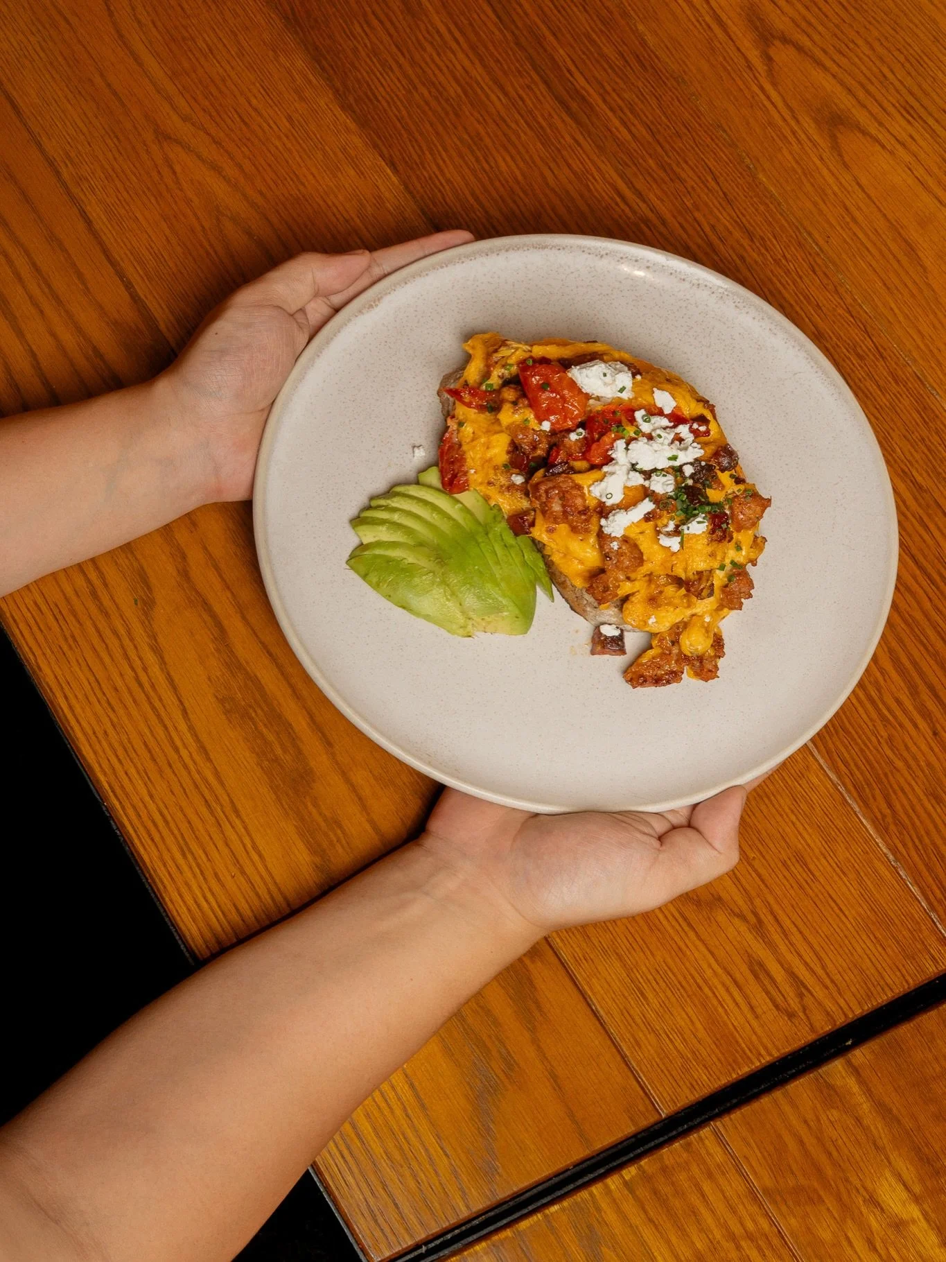 A bold take on a brunch classic, this plate delivers savoury richness with fresh, creamy contrasts.

The Chorizo Scramble is flavourful, satisfying, and designed to leave you feeling well taken care of from the first bite.

Available for brunch at ou