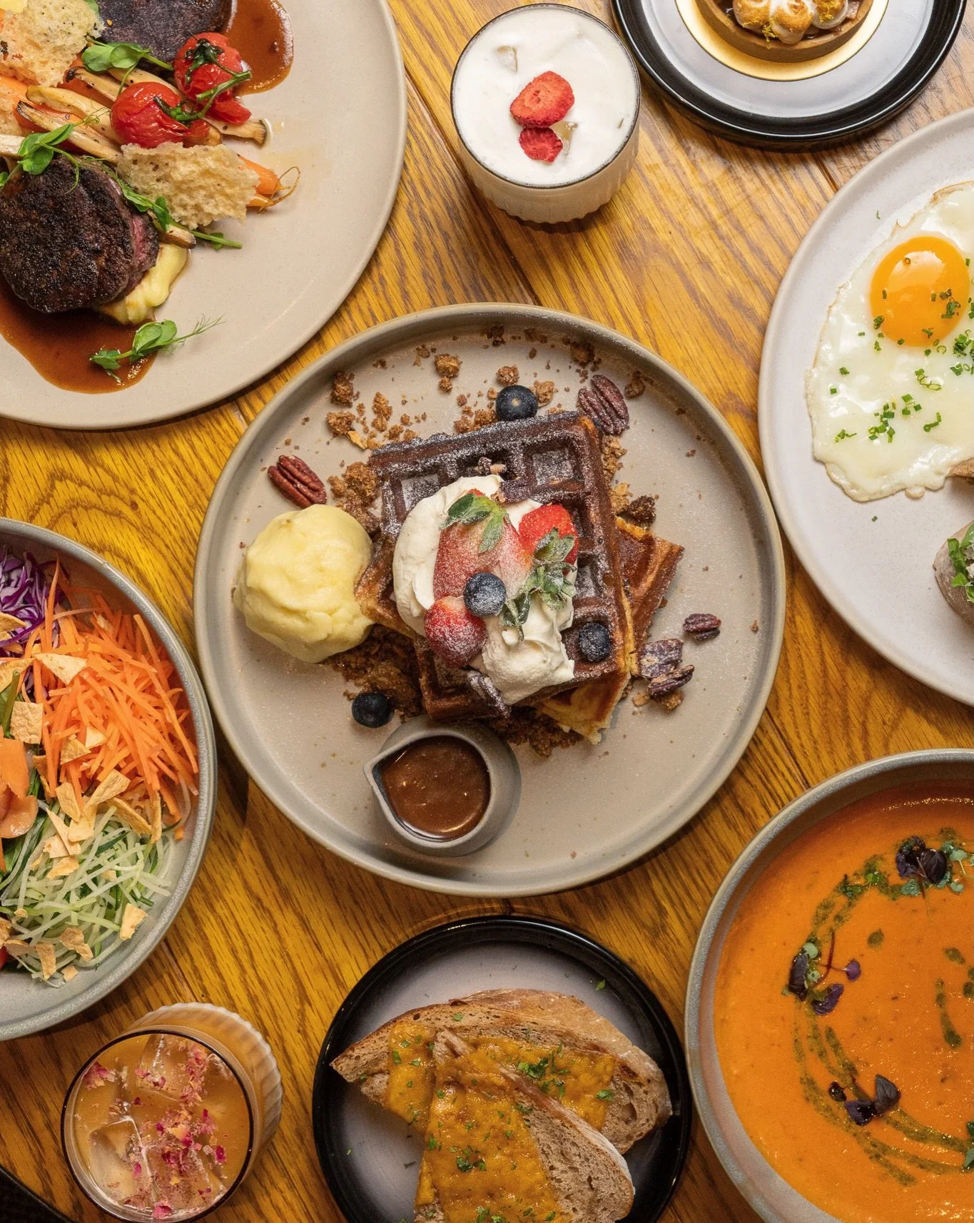 Available through both lunch and dinner, our Five Oars Waffles bring together crisp textures and layered sweetness in a single plate.

Built on housemade sourdough, each element adds depth and contrast, creating a dessert that feels both comforting a