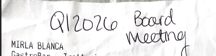 image of top of business receipt showing added details of meal written on "Q1 2026 board meeting"