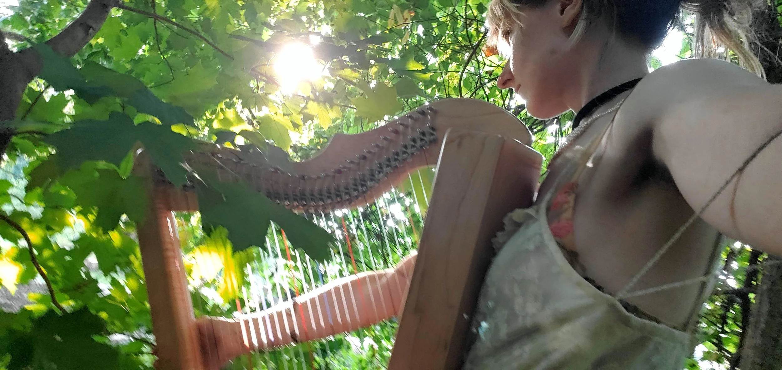 Enjoying the sunlight during a music video shoot in the woods