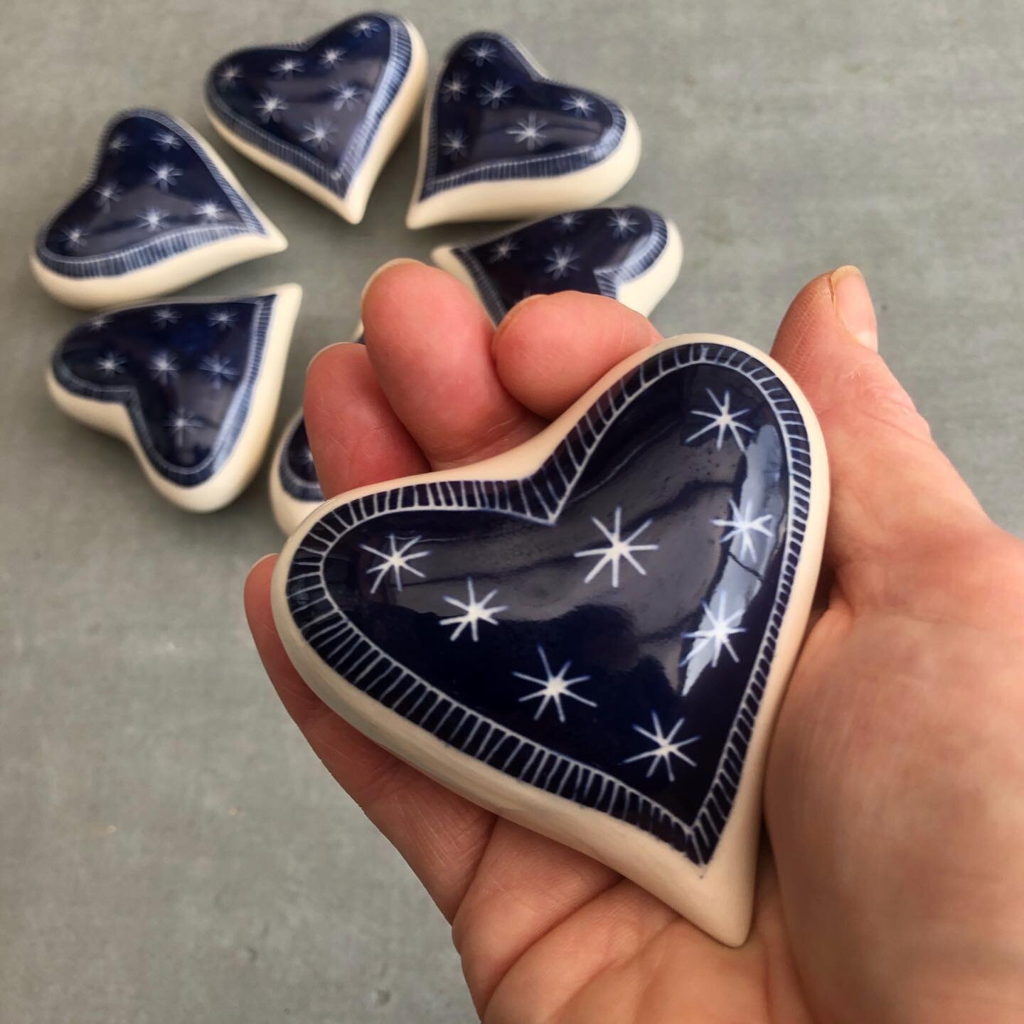 I love making these heart shaped pebbles . They are so nice to hold in your hands and think of loved ones #heartsofinstagram #ceramichearts❤ #ceramicpebbles #valentine