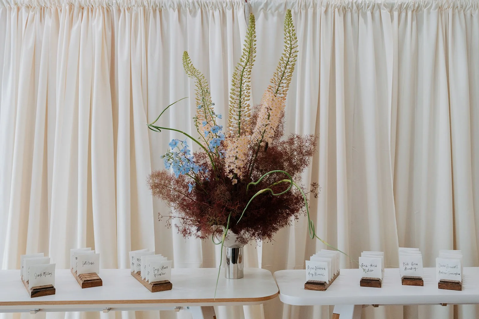 image of floral design on escort card table Wedding florals