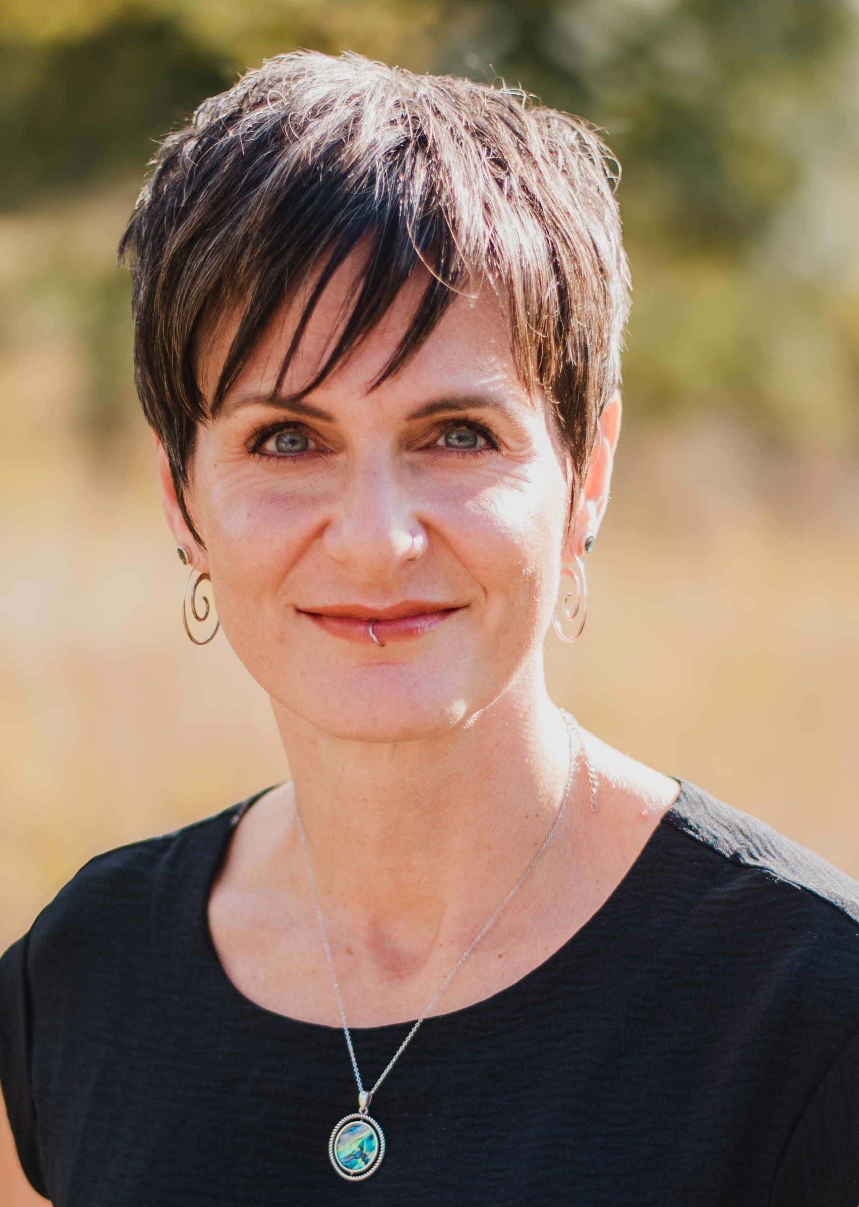 Portrait of Cornelia Scott, EMDR therapist and trauma integration practitioner.