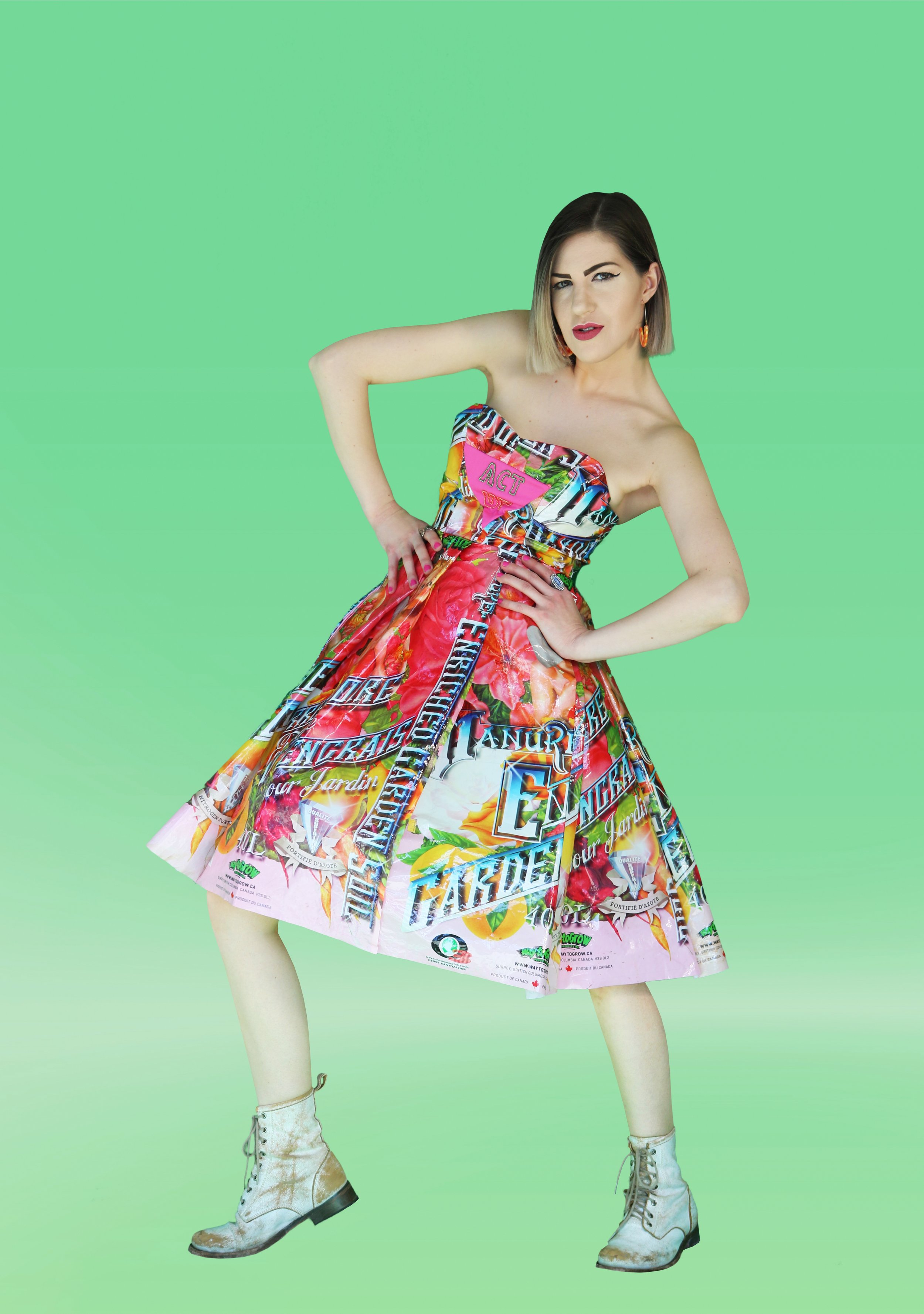 Act Up by Nicole Melnicky, 14 x 20”, Garment Constructed from Manure Trash Bags, Twill Canvas, Beaded Embellishment, 2021.