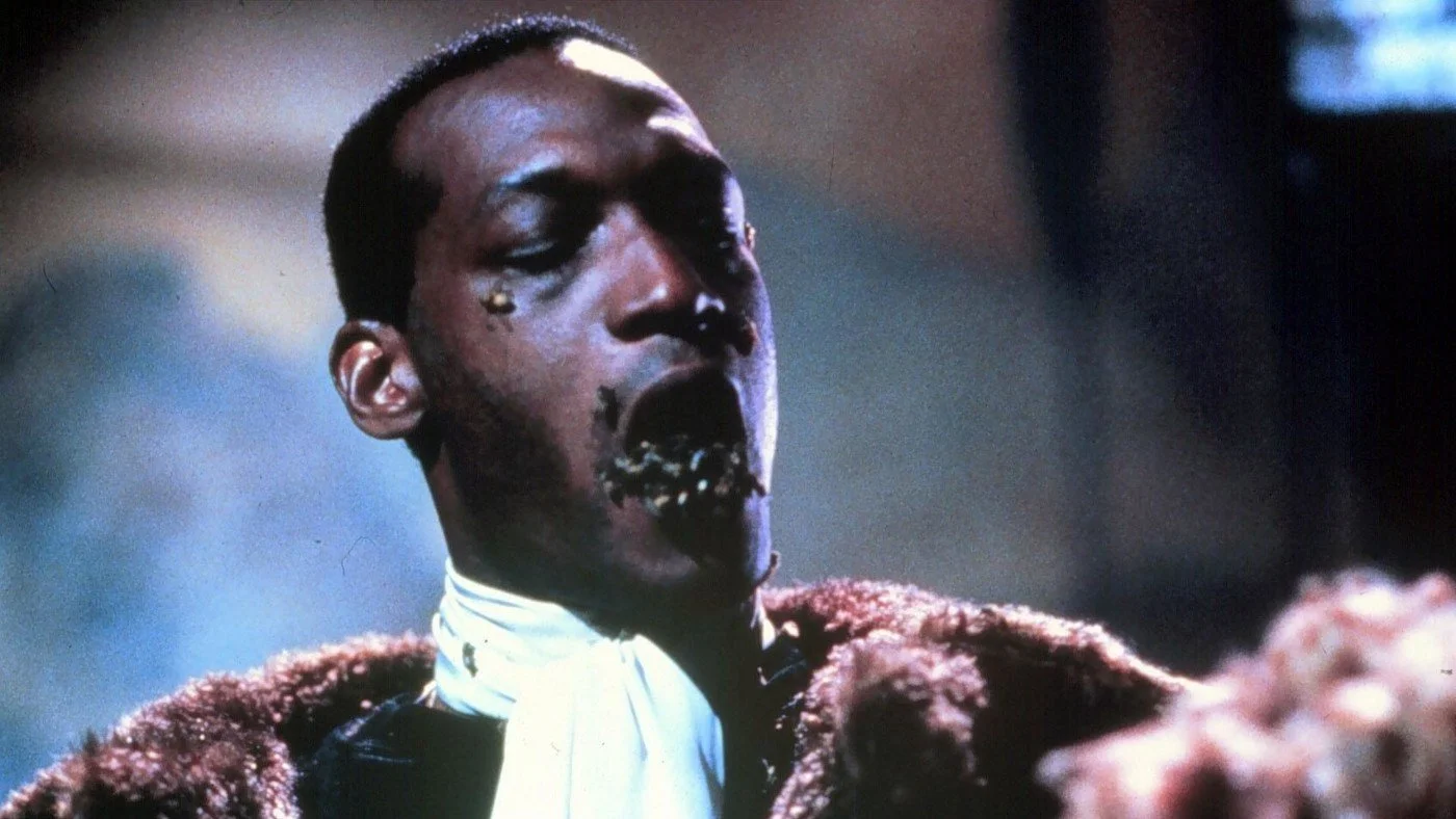 Image of Tony Todd as 1992's Candyman. Bees crawl out of his mouth and over his face.