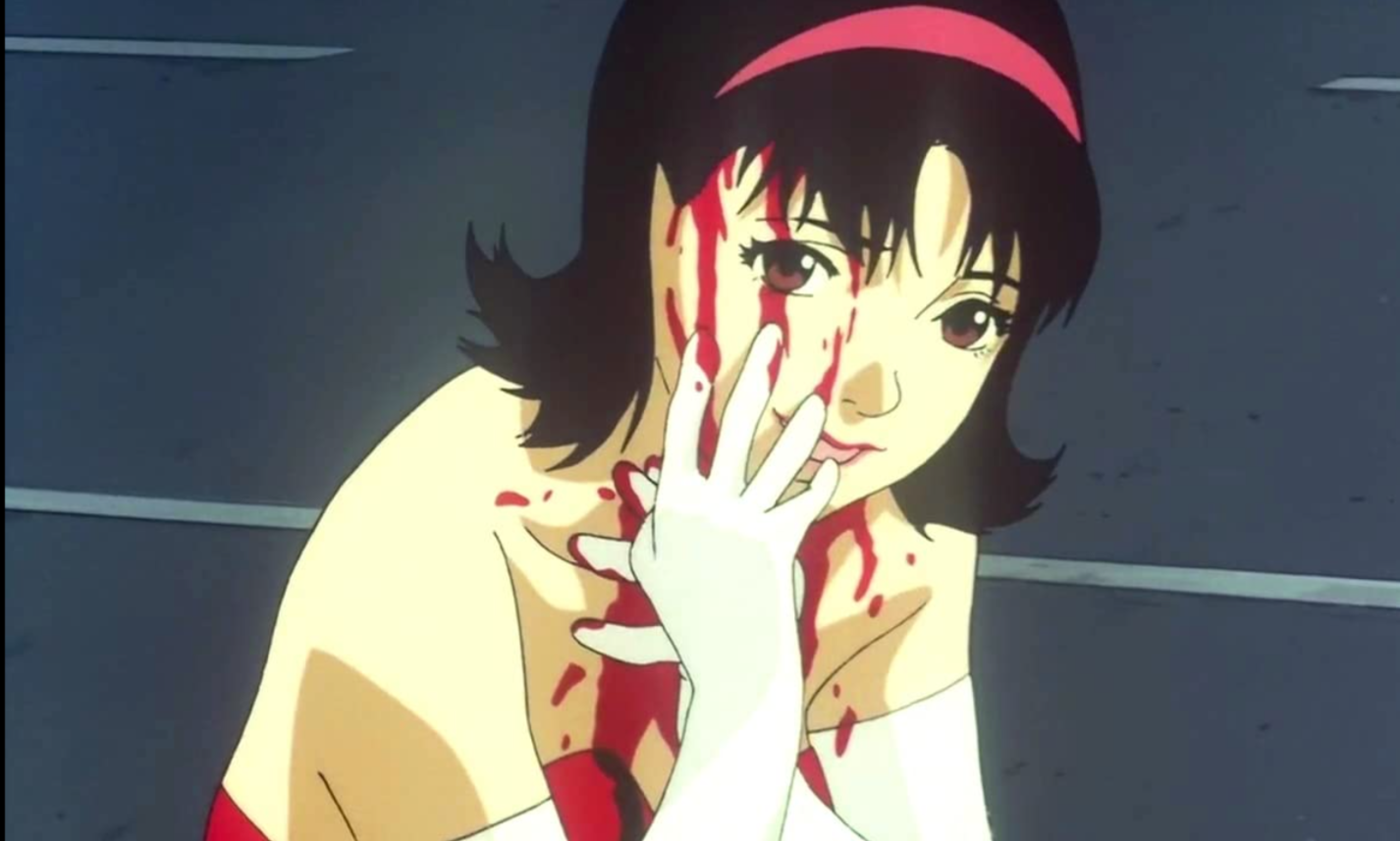 Mima from Perfect Blue running a bloody, gloved hand down her face.