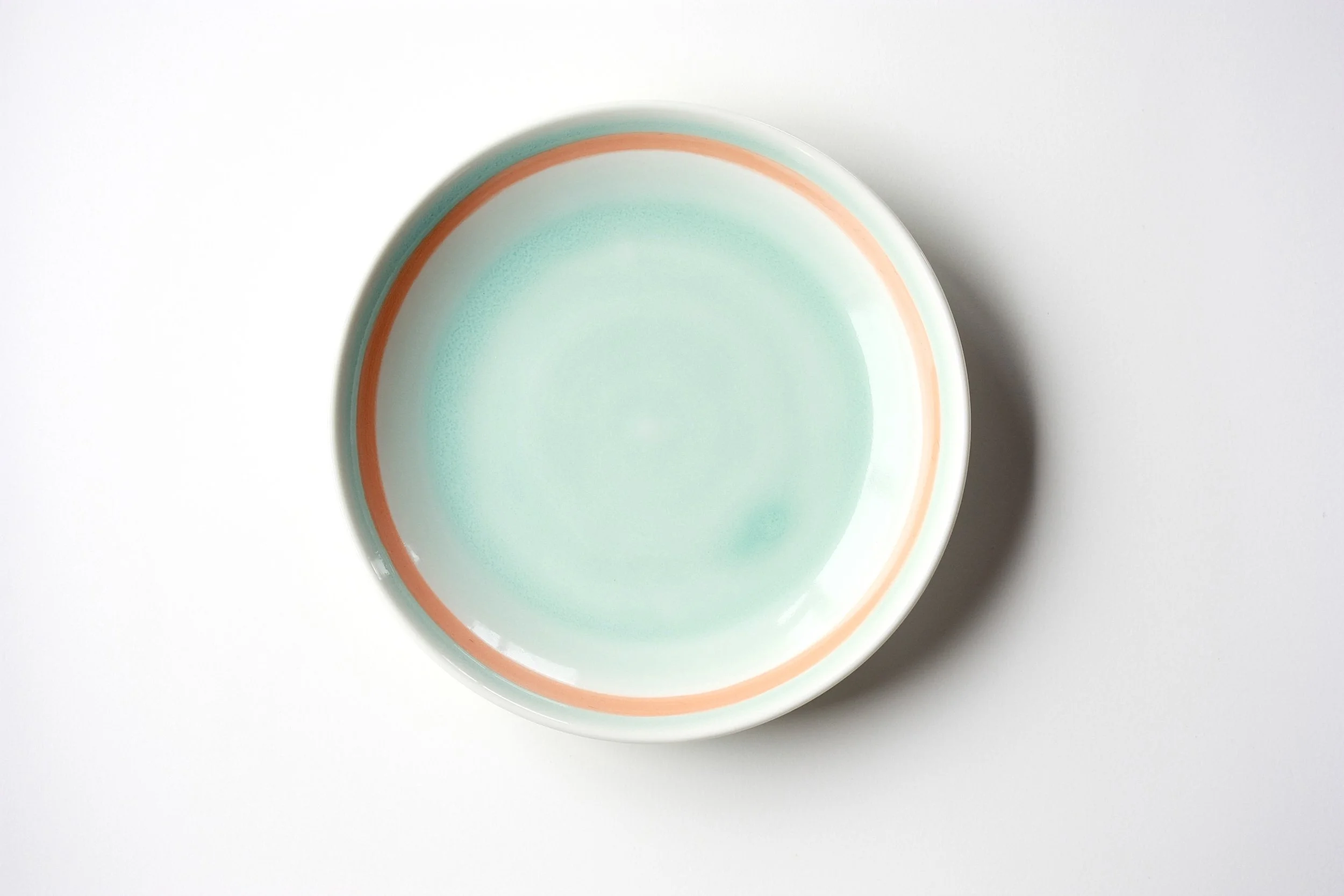 Porcelain side plate, orange rim