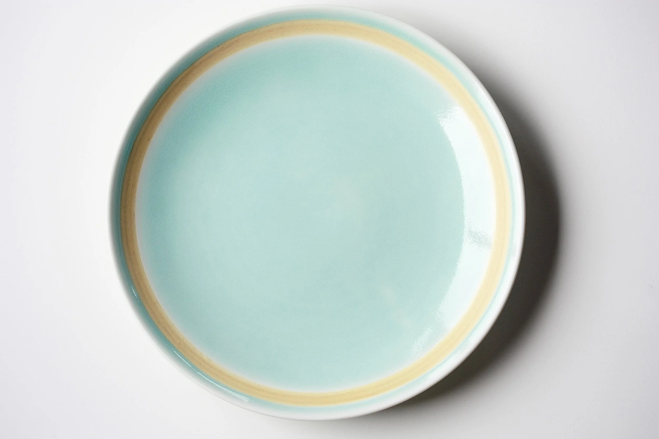 Porcelain dinner plate, yellow ochre rim