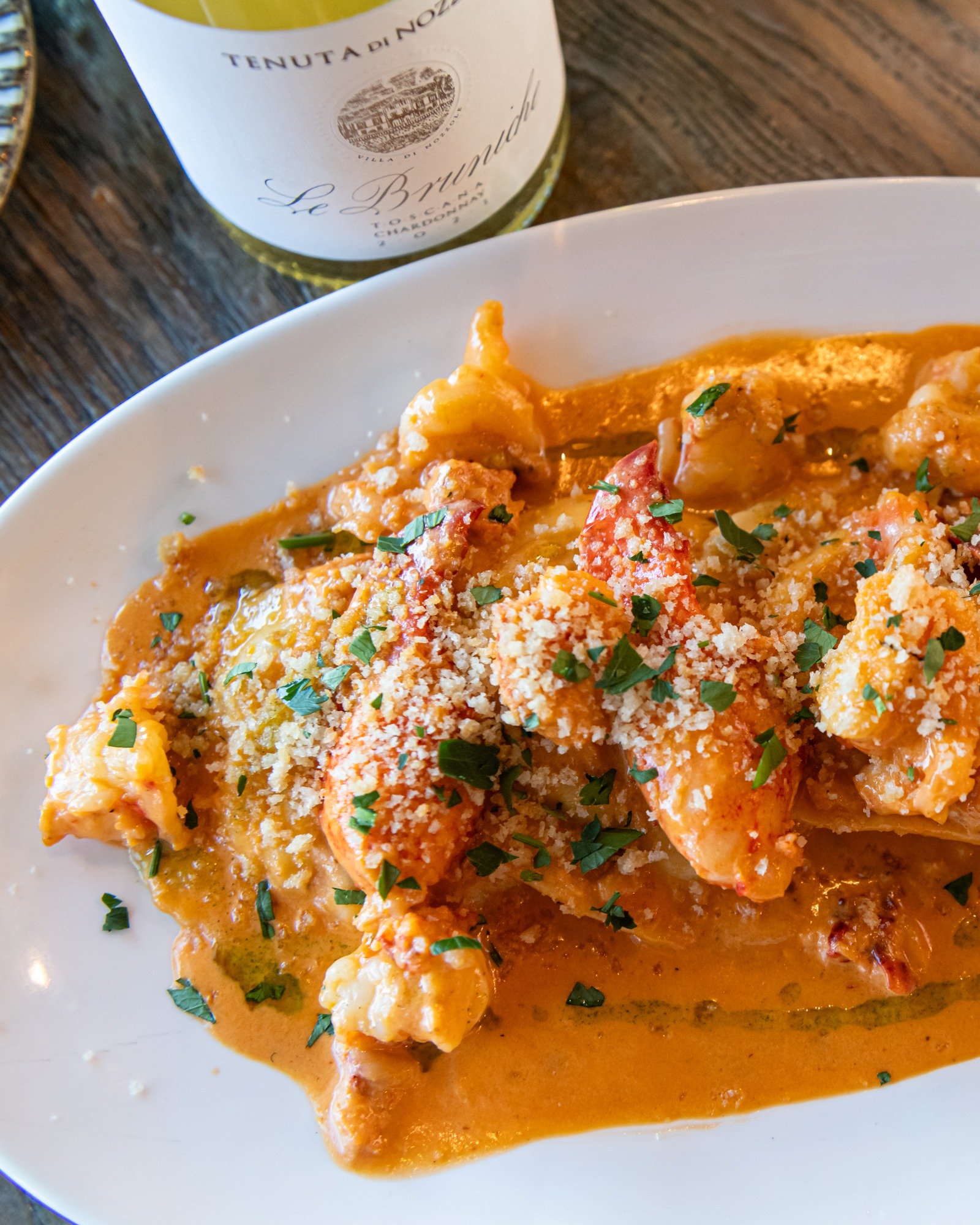 To say we're obsessed with our new Ravioli All'Aragosta would be a huge understatement. We literally can't get enough! 

This masterpiece is shrimp stuffed ravioli, with cherry tomatoes, garlic, parsley, lobster stock, lobster knuckle, and uni butter