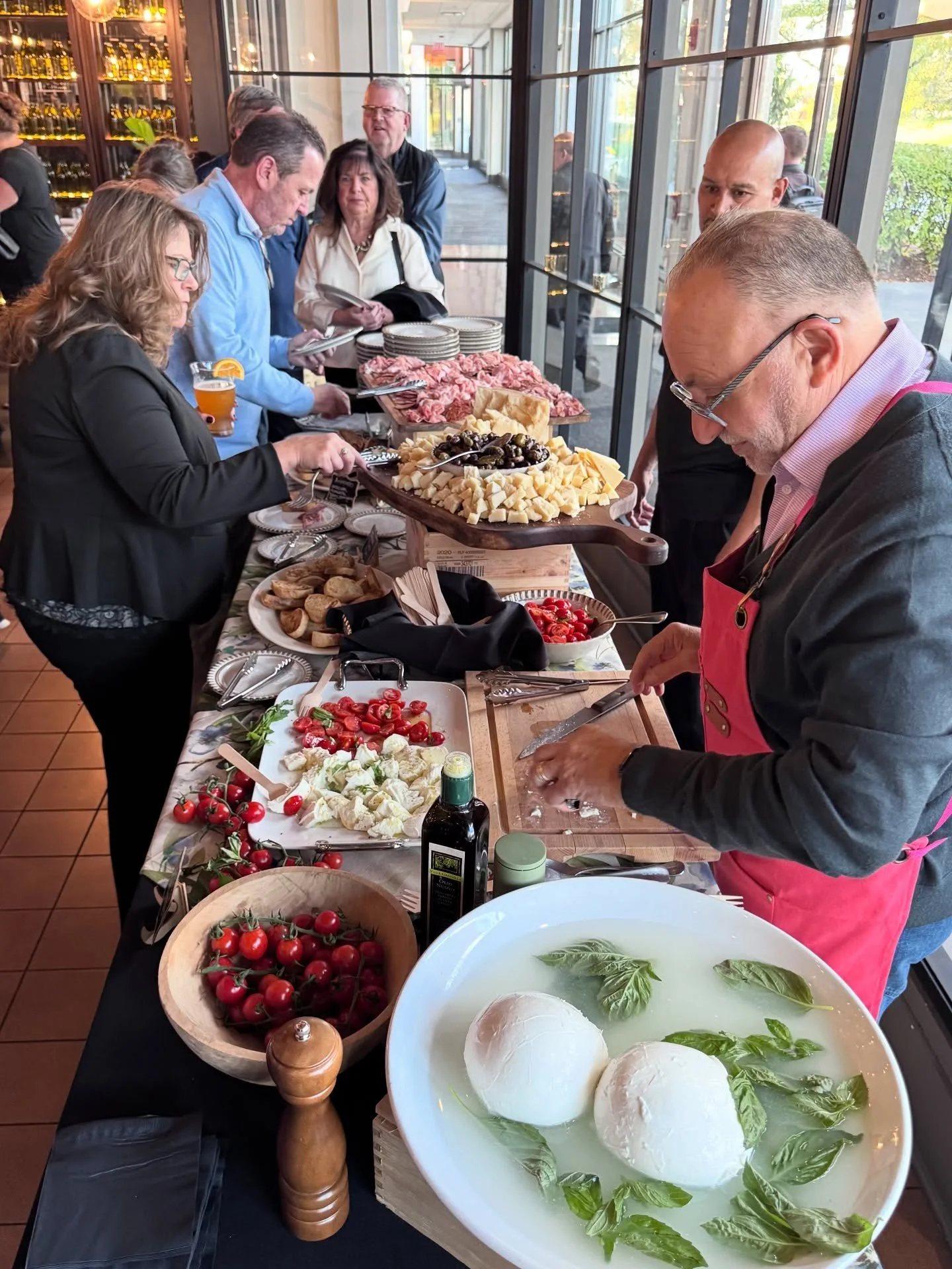 When you visit us at Lucca, you can always expect a bounty of food! We love hosting special events when we can build beautiful displays. And as you can see, Chef Claudio is in his element! Reach out to our team to start planning your next event. LINK