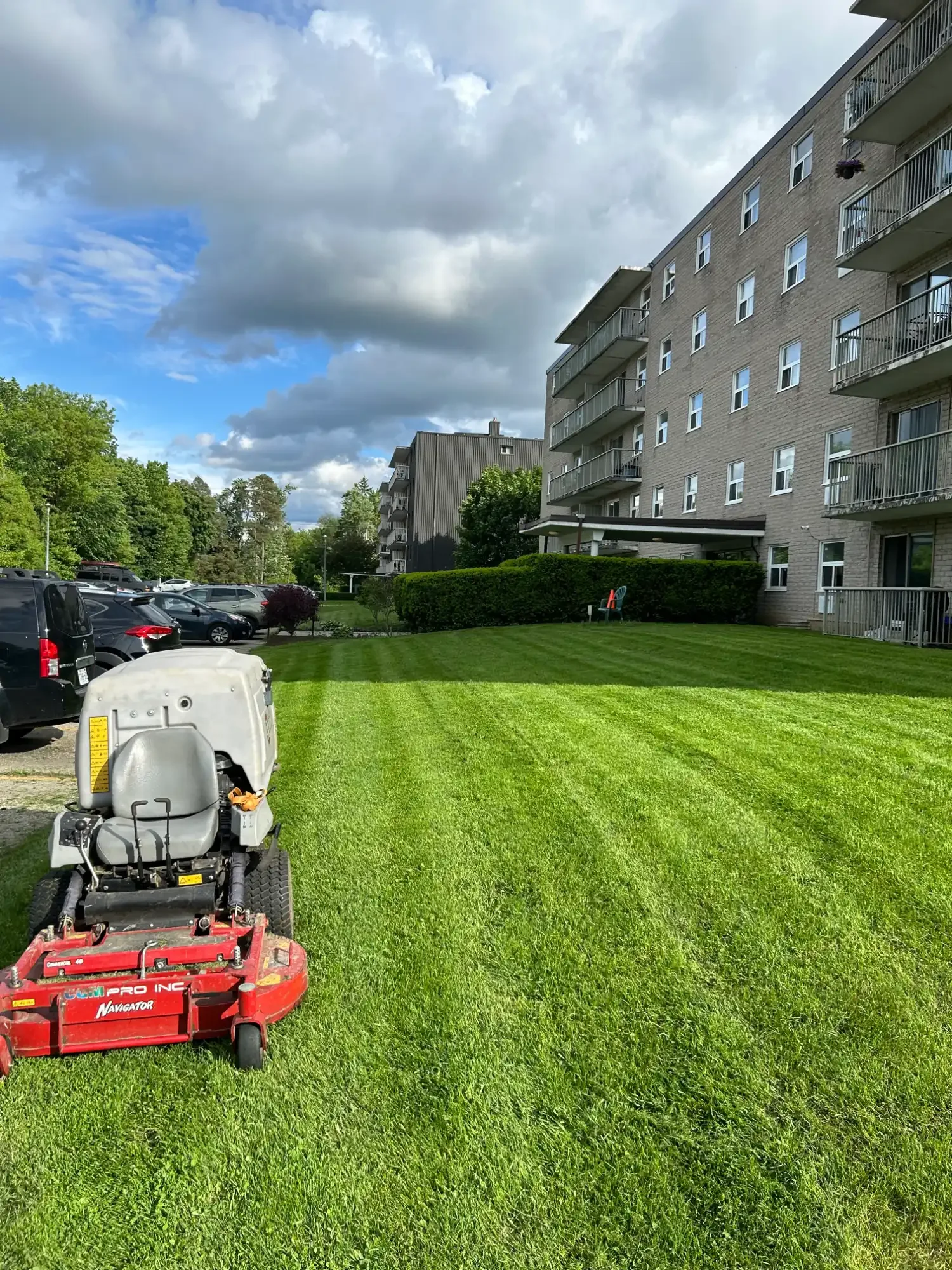 Professional lawn cutting using commercial grade equipment in Guelph, Ontario