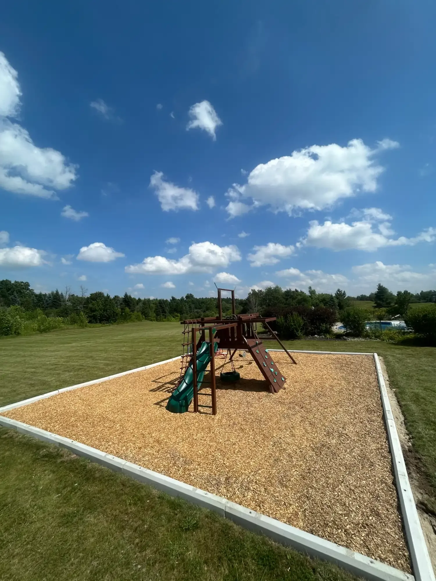 Playground installation by Brothers Landscaping in Puslinch, Ontario