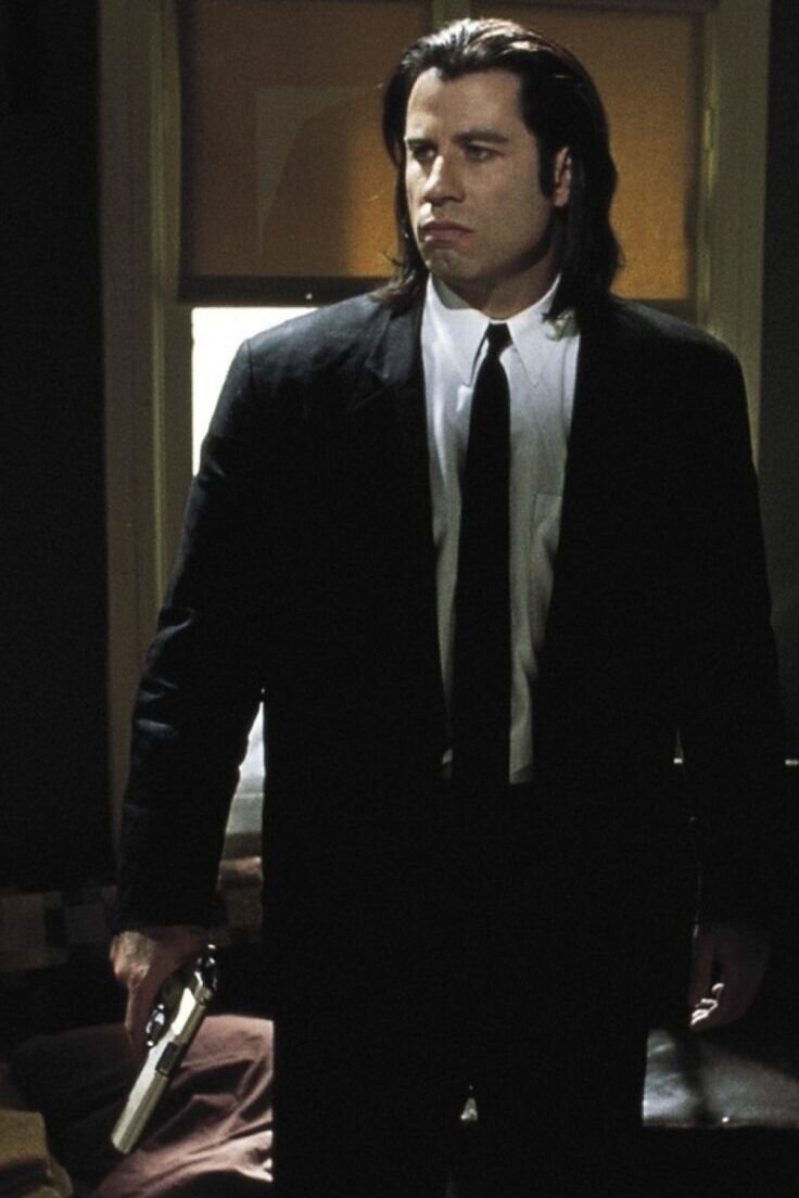John Travolta as Vincent Vega in Pulp Fiction