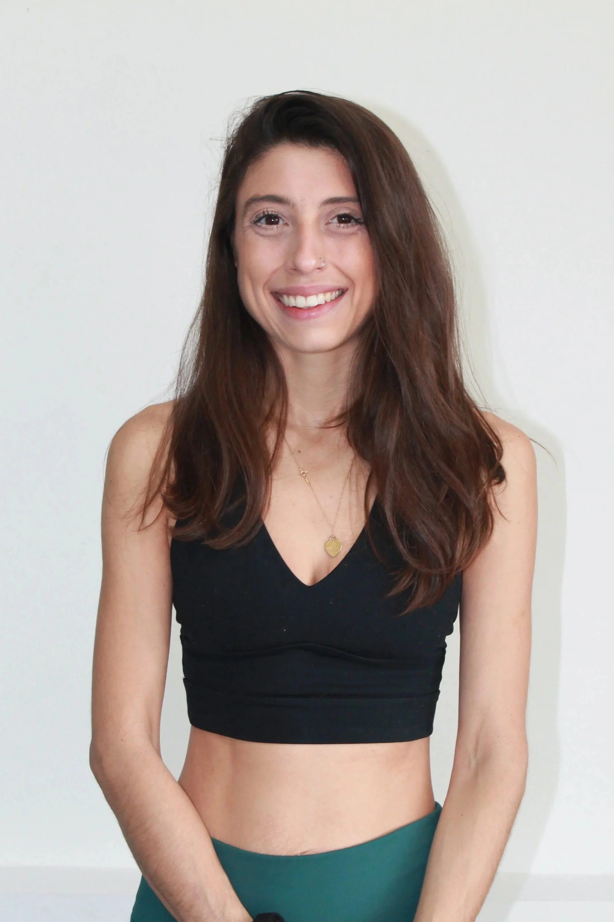 Michelle, instructor of Oasis Yoga Studio in Kuna, Idaho, smiling headshot