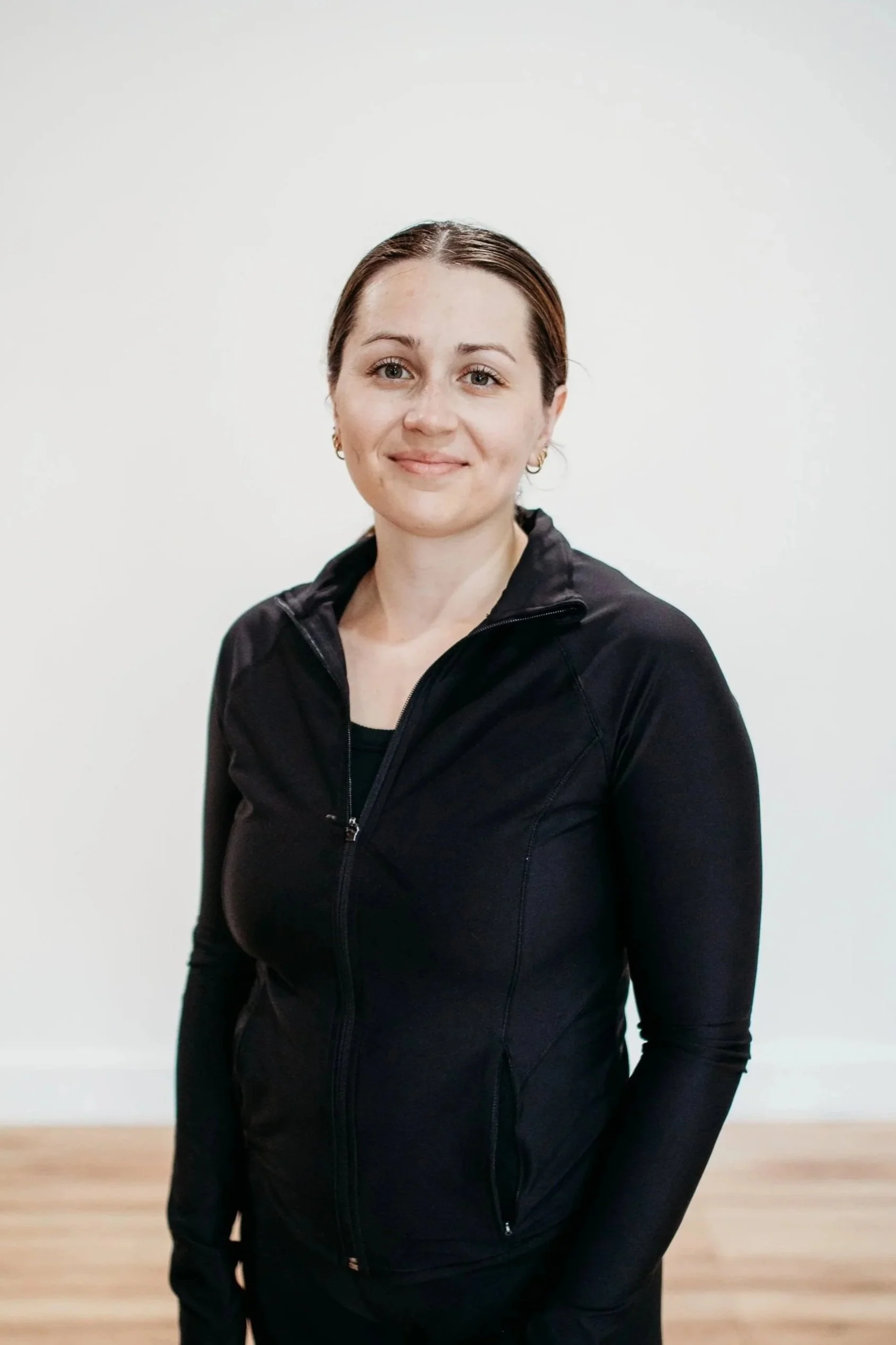 Allie, instructor of Oasis Yoga Studio in Kuna, Idaho, smiling headshot