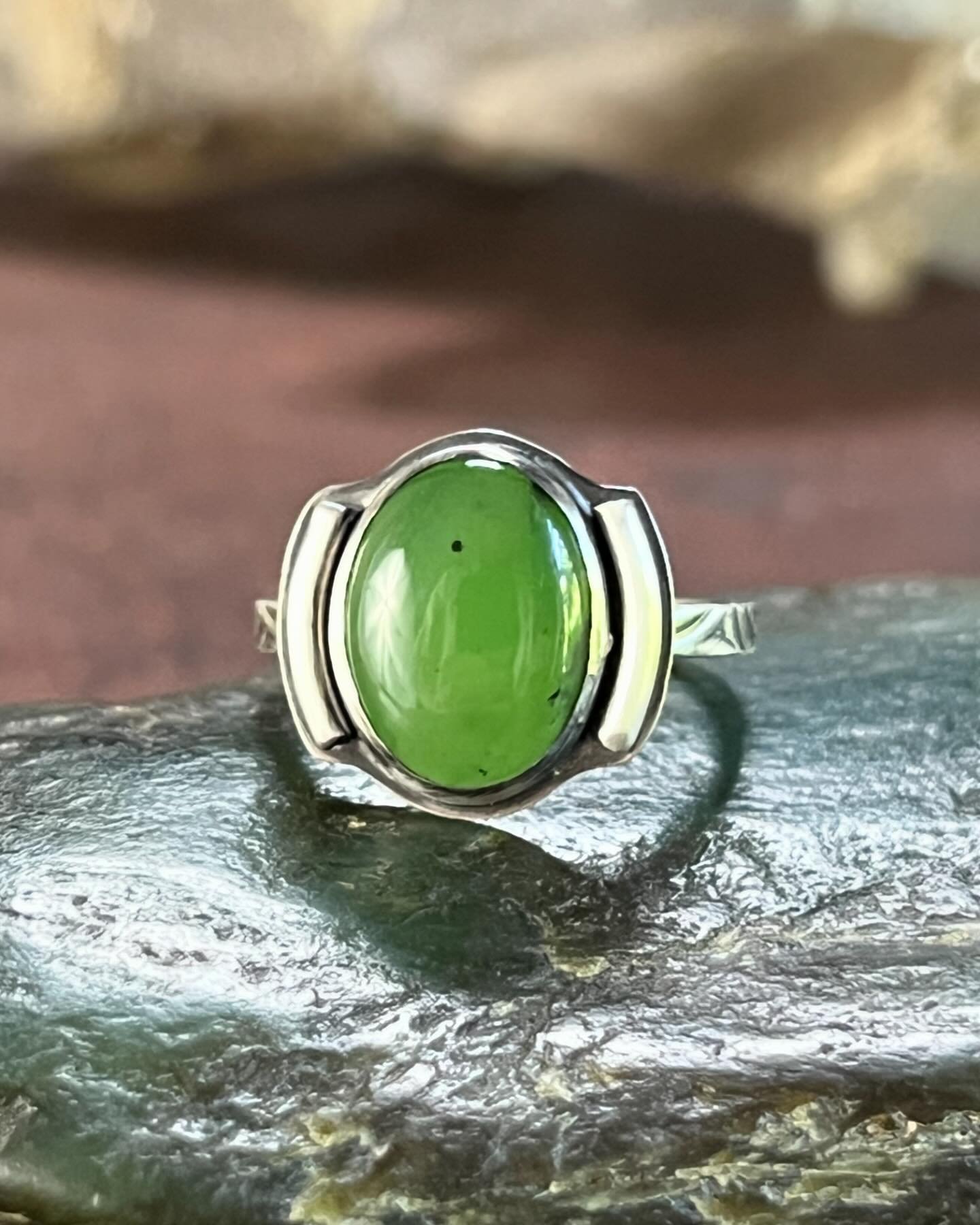 Introducing a size 7.5 sterling silver ring showcasing a mesmerizing green Siberian jade stone, capturing nature&rsquo;s allure with understated sophistication.

Added to my etsy store!