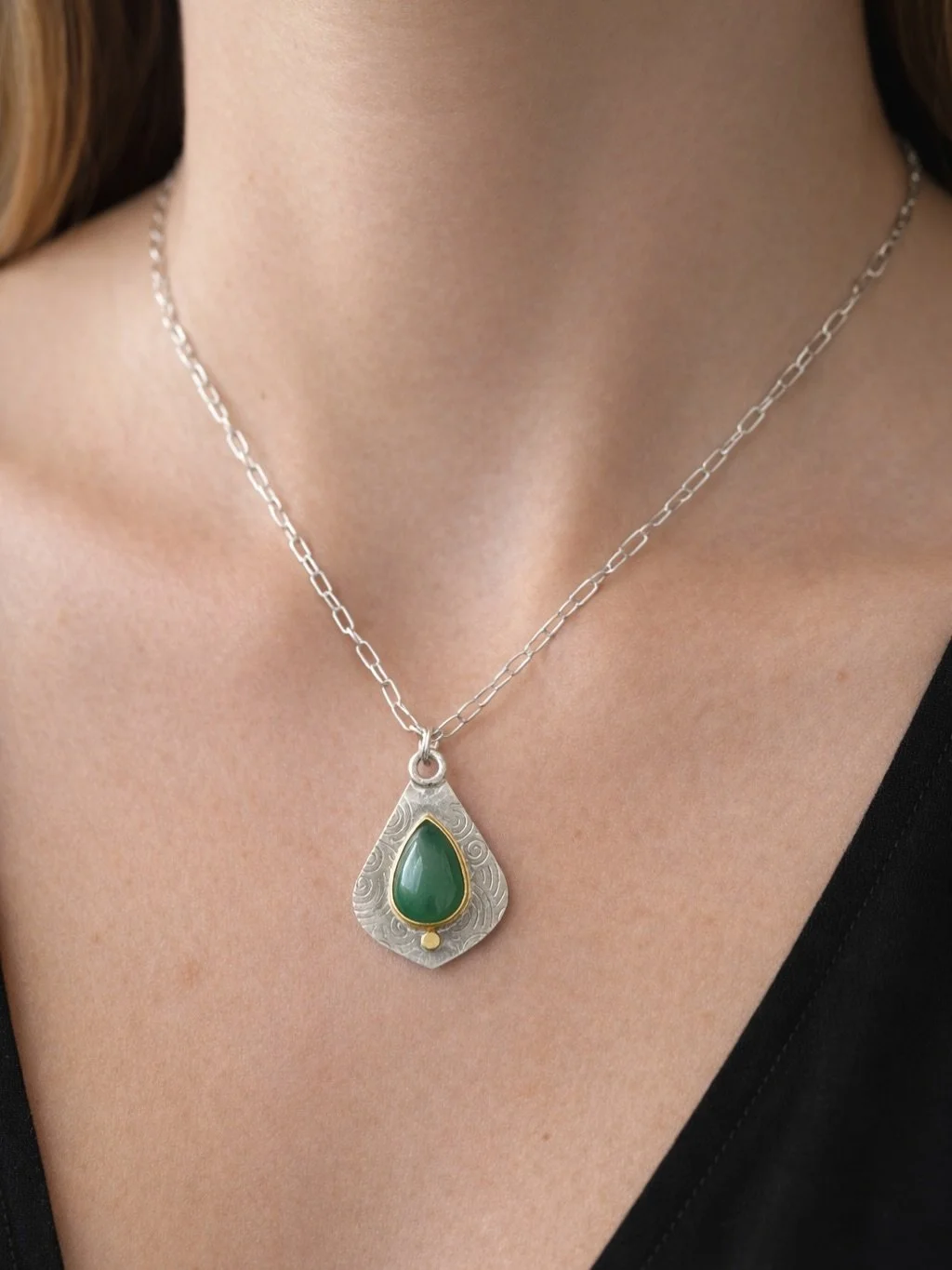 Just added to Etsy.
Gem-quality Big Sur jade set in 22k gold with a solid 22k accent on textured silver.
