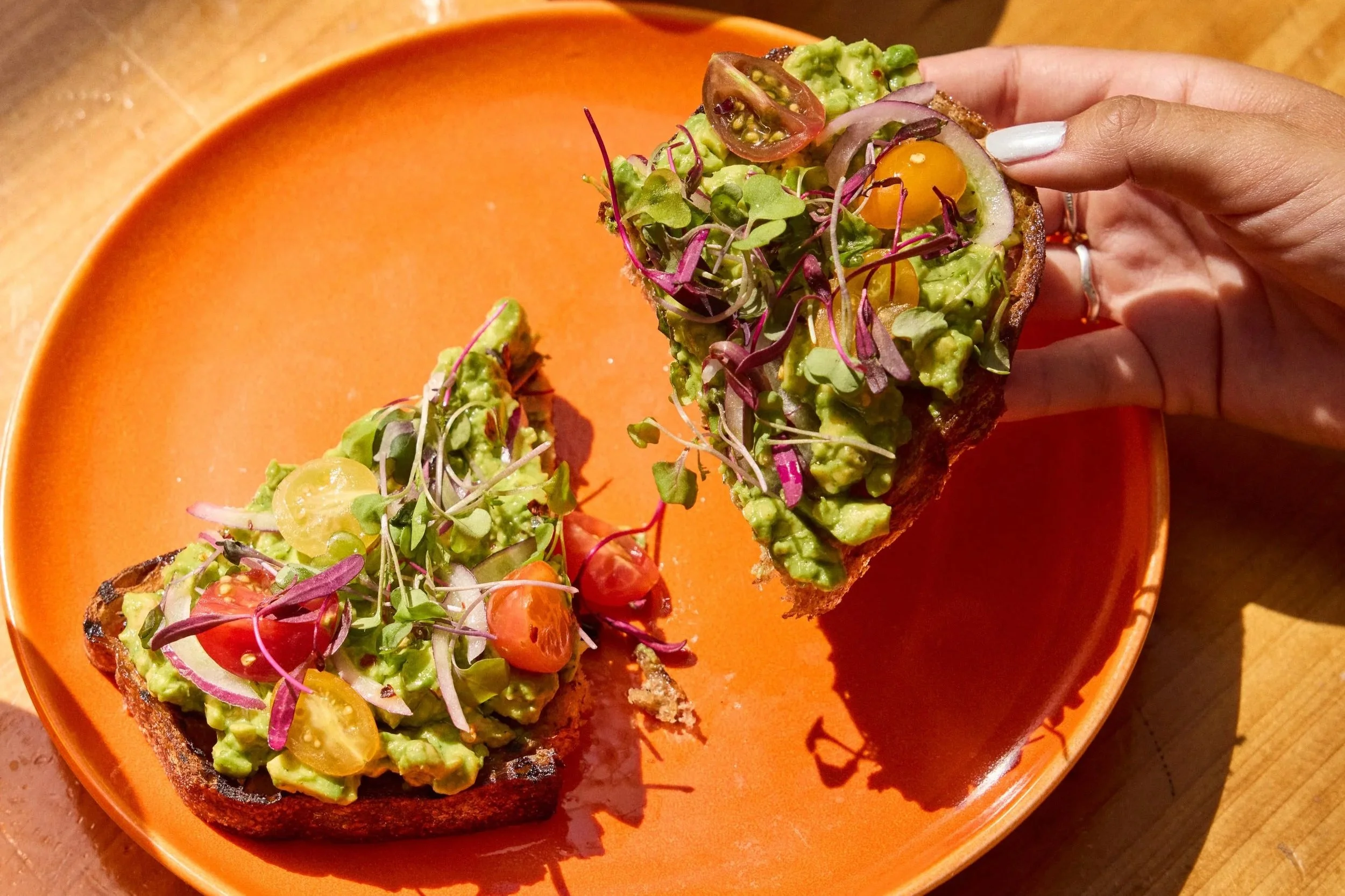 On the weekends, try the Smashed Avocado Toast. Served on sourdough with hass avocados, heirloom tomato, and red onion.