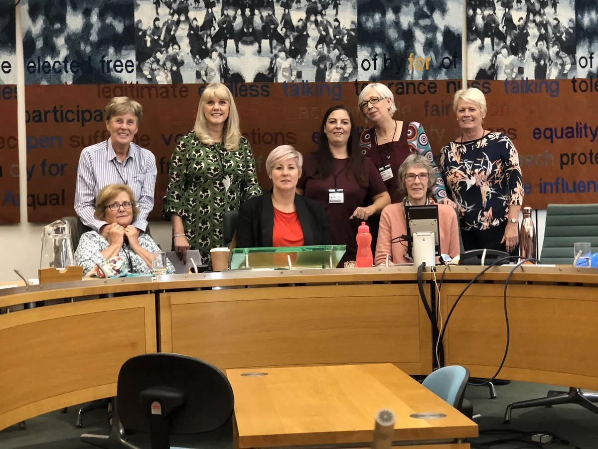 Hannah Bardell MP (seated, centre) with contributors to the APPG including co-Founder of Murdered Abroad, Eve Henderson (back, right)