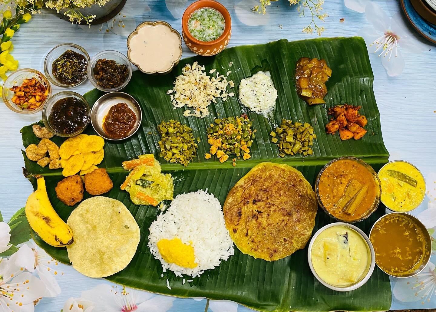 Happy Tamil New Year 🙏Happy Vishu . 

Our Tamil new year Vishu combined menu 😋

🍀Manga pachadi 
🍀Cucumber curd pachadi 
🍀Vazhakkai podimas ( raw plantain crumble )
🍀Avarakkai Thoran 
🍀Cluster beans Thoran 
🍀Avial 
🍀Potato fry. 
🍀Beans Parup