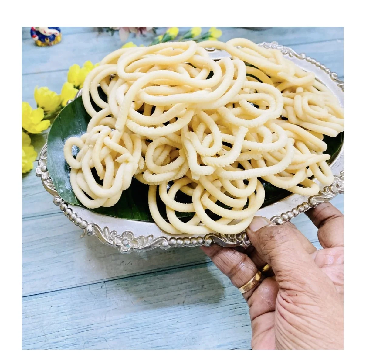 Golden, crunchy Chettinad Thengoyal prepared with coconut milk β festive South Indian snack