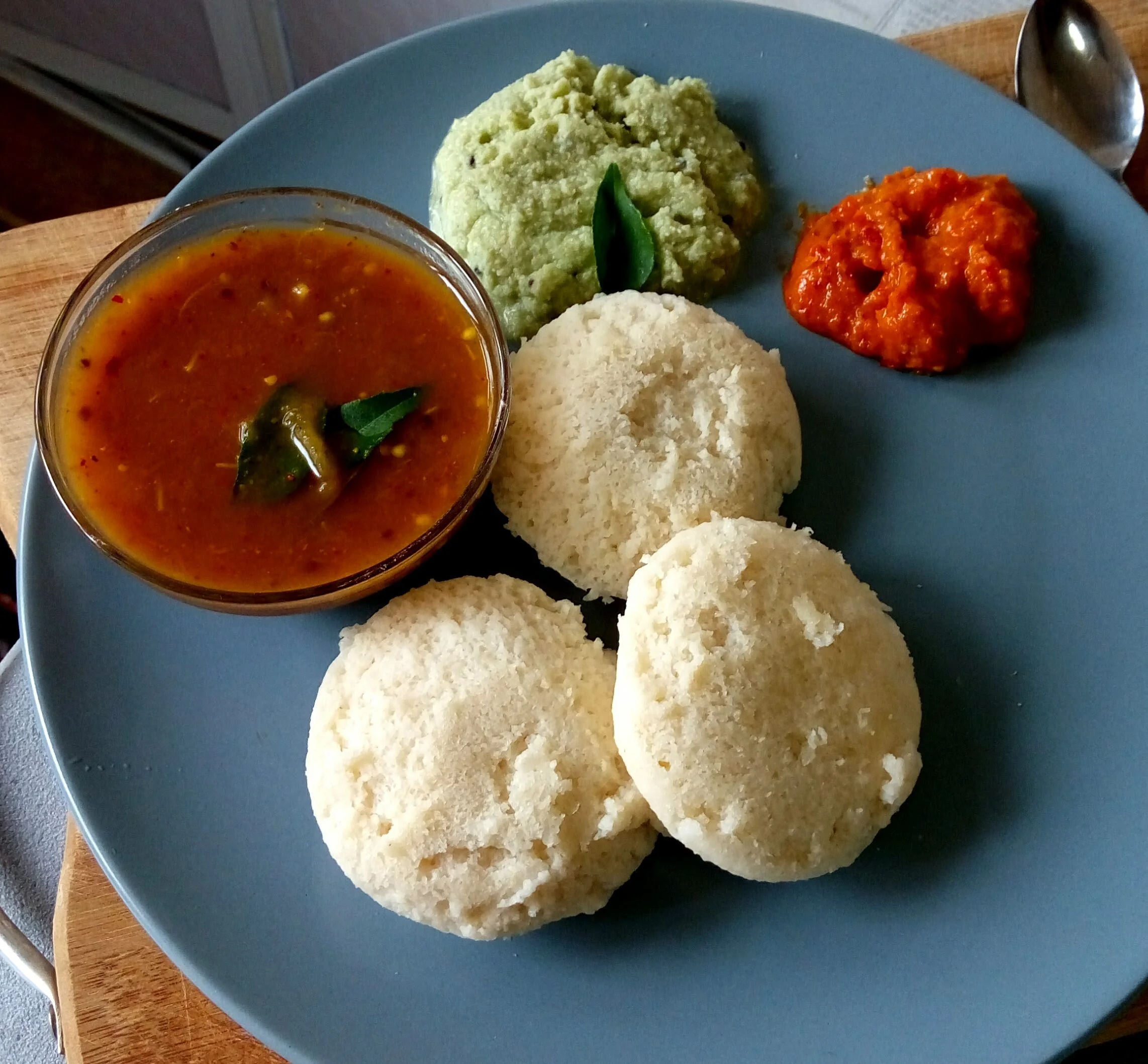 Traditional South Indian Brinjal Gothsu served with Pongal or idlis