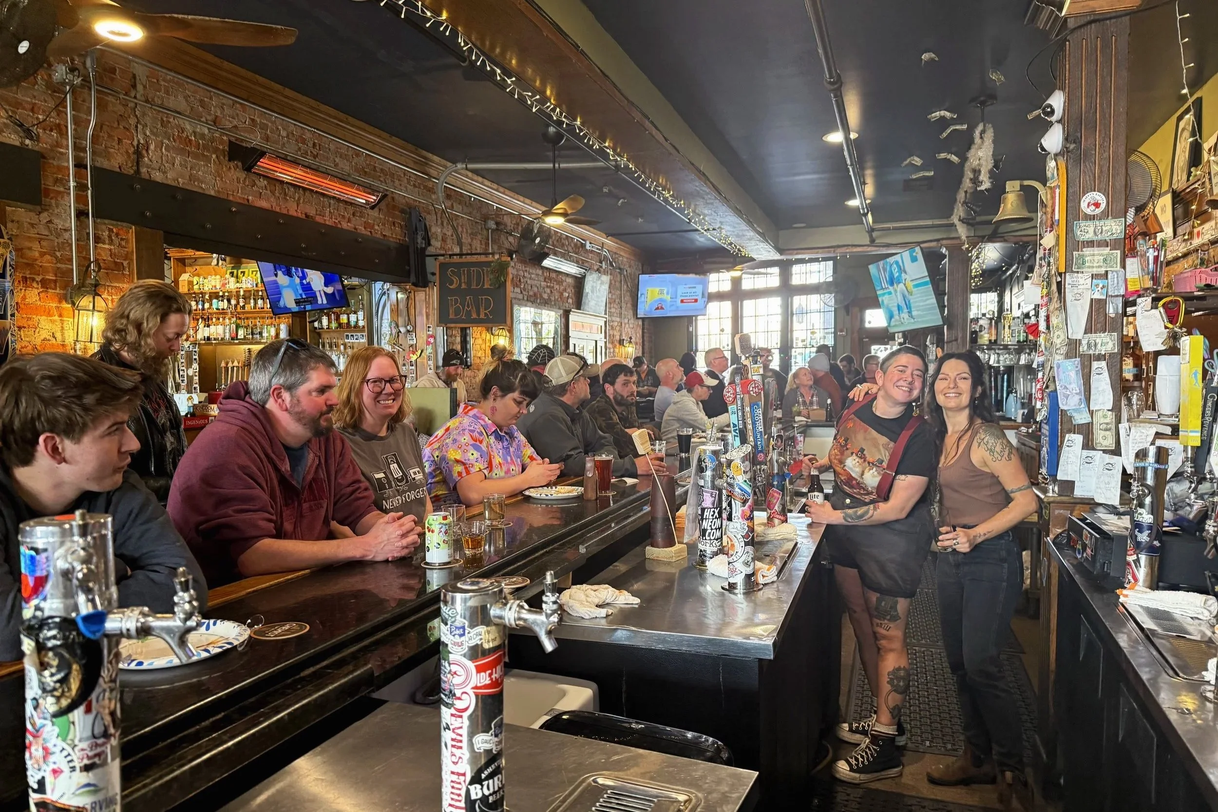 Food and Drinks in Asheville, local bar in Asheville, Queer friendly. Affordable drinks and snacks, large variety of tap selection including non alcoholic options