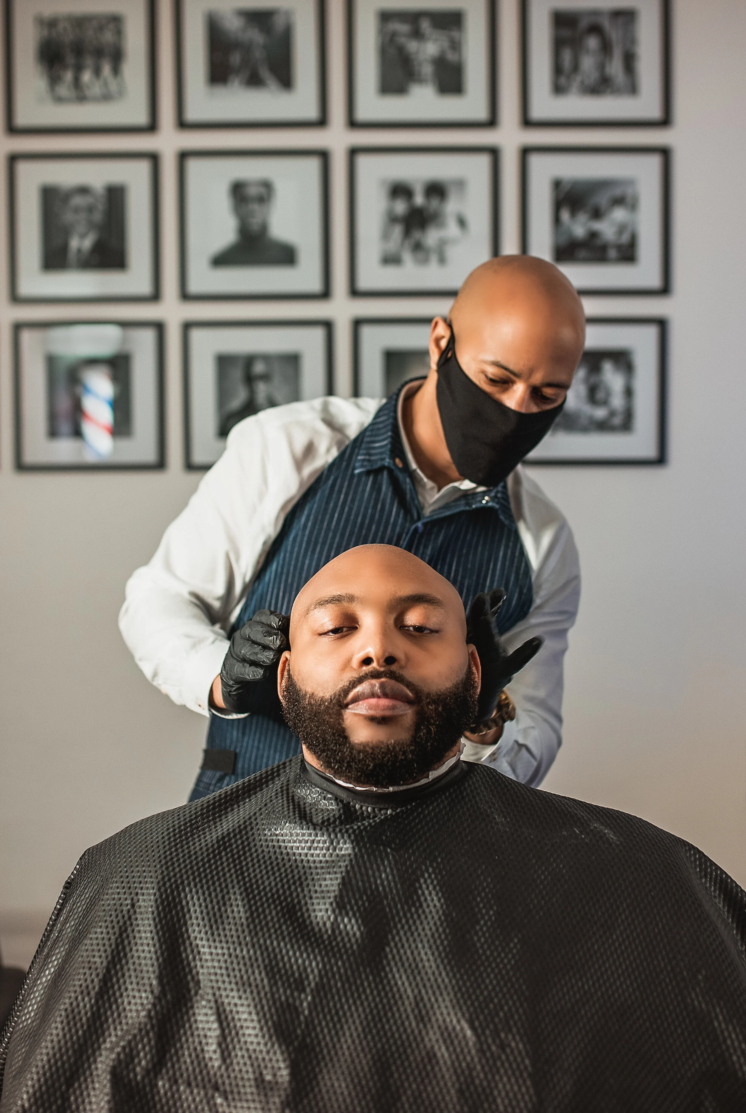 Master Barber Demetrius Kiel styling an executive client at Groomed by Kiel barbershop in Huntsville, AL